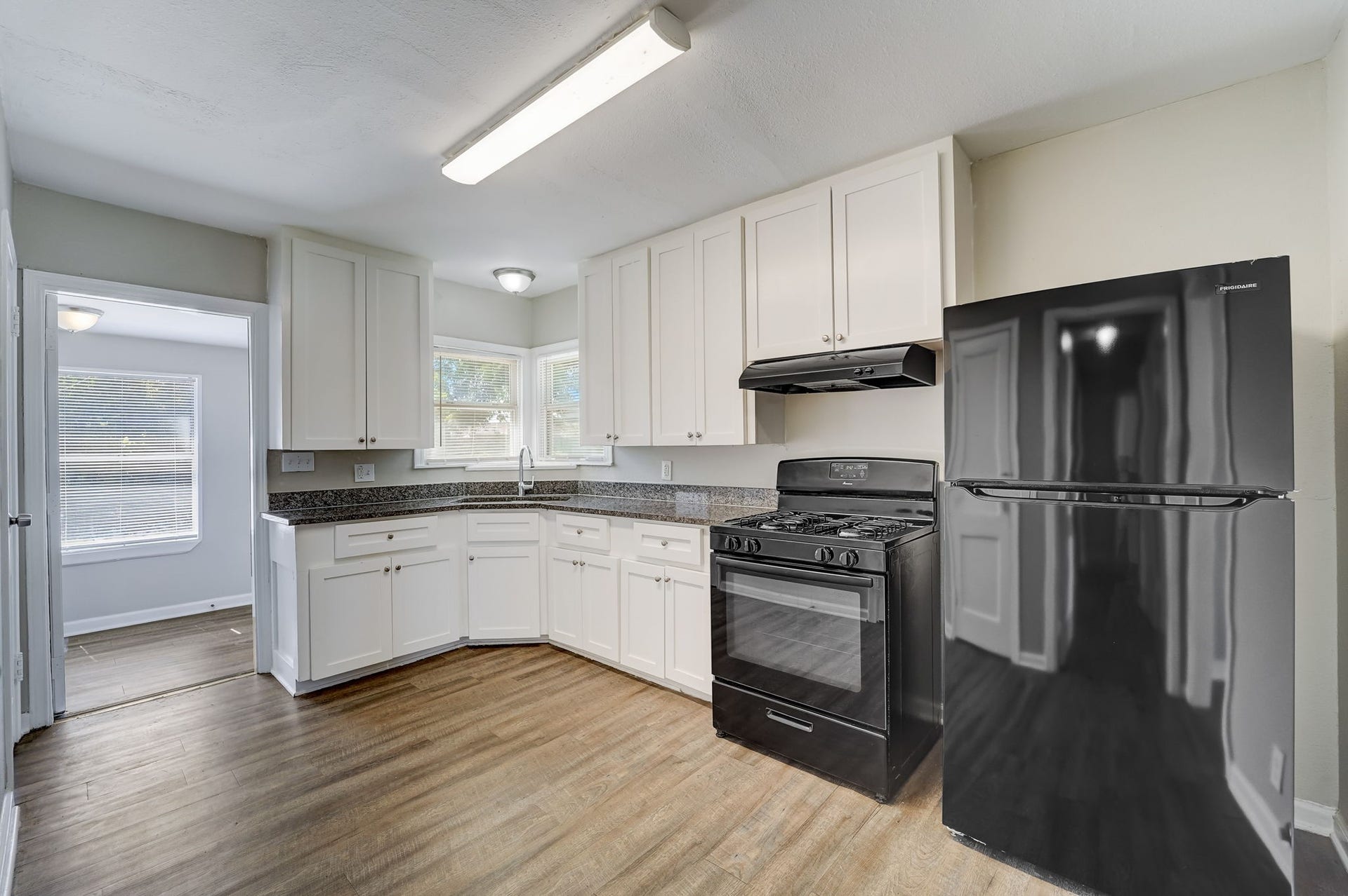 1420 Foreman Street, La Marque, TX 77568 Spacious kitchen space with granite counter tops. Gas range stove and new refrigerator included with lease.