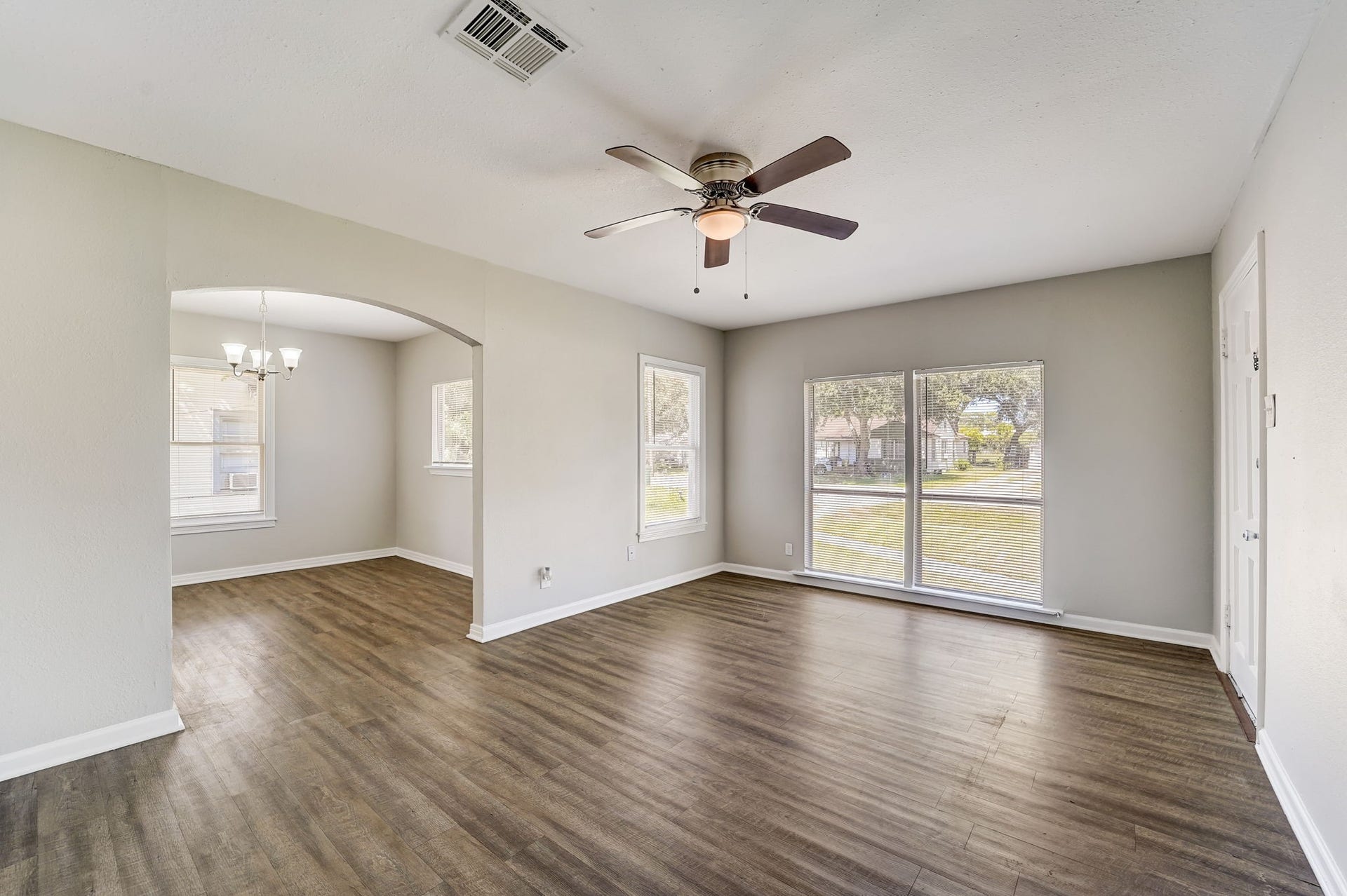1420 Foreman Street, La Marque, TX 77568 The living room opens up to the dining area. Lots of natural light!