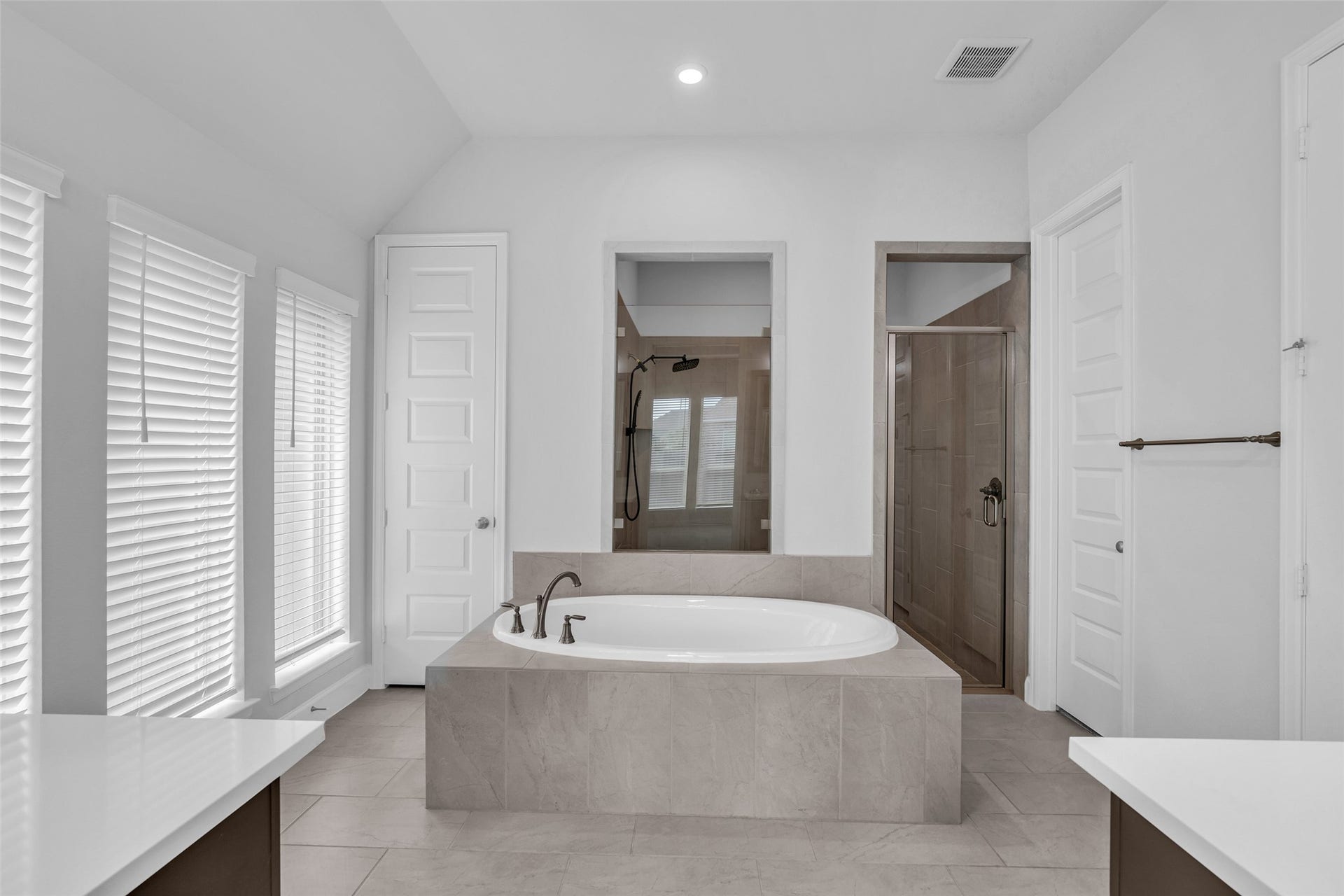 2215 Carrol Creek Drive, Richmond, TX 77469 Primary hollywood style bathroom with oversized shower and dual closets
