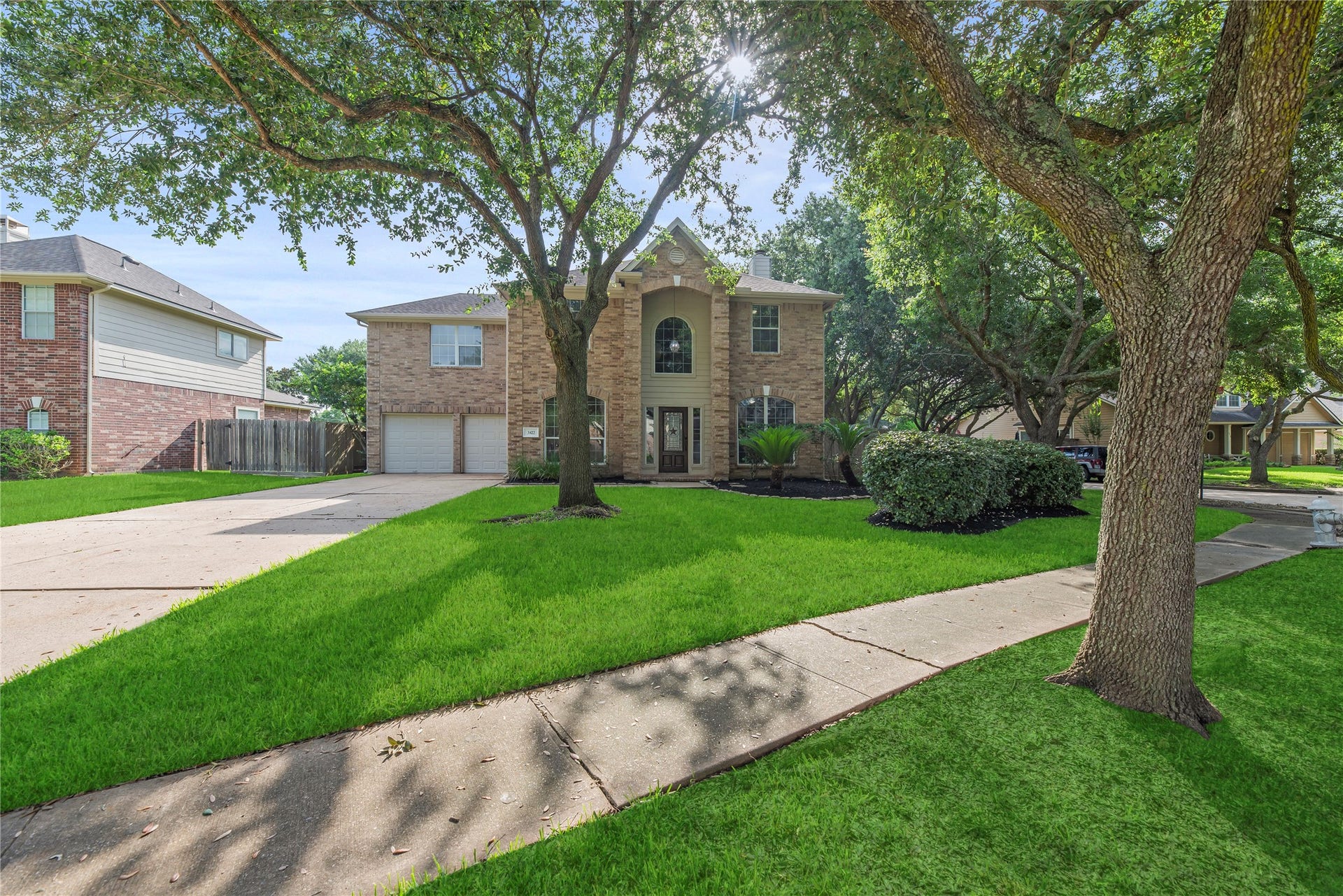 3422 Powell Way, Missouri City, TX 77459 Lush landscaping on a tree-lined street!
