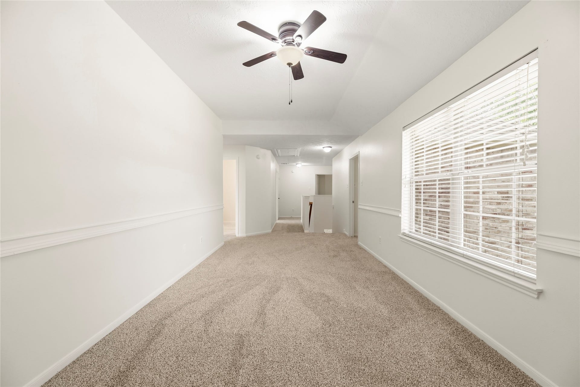 3422 Powell Way, Missouri City, TX 77459 Fabulous and versatile upstairs game room! Featuring brand new carpet, ceiling fan, and fresh paint.