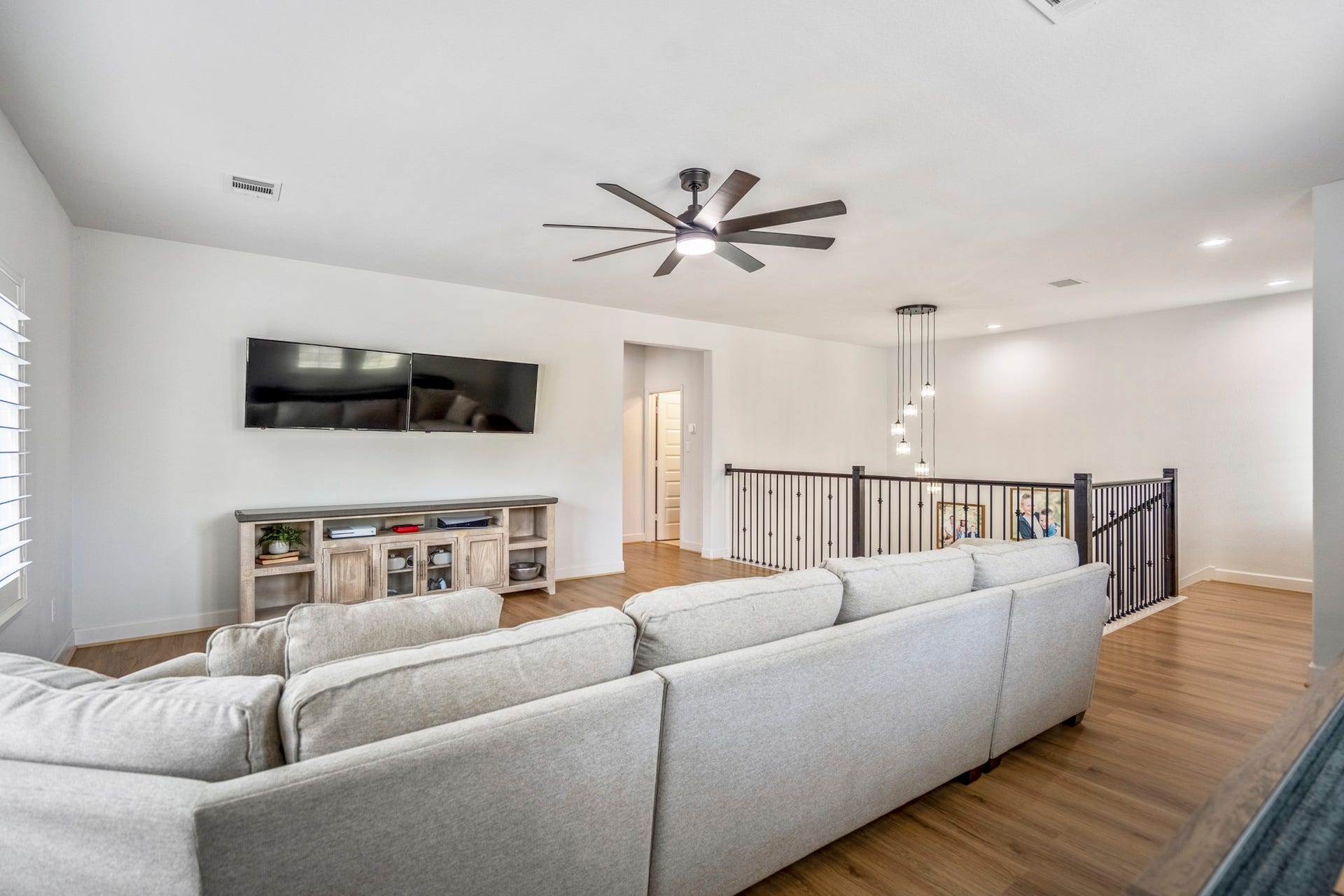 304 Mullins Court, Montgomery, TX 77316 Through that hallway is a full guest suite, two additional bedrooms and a full bath.