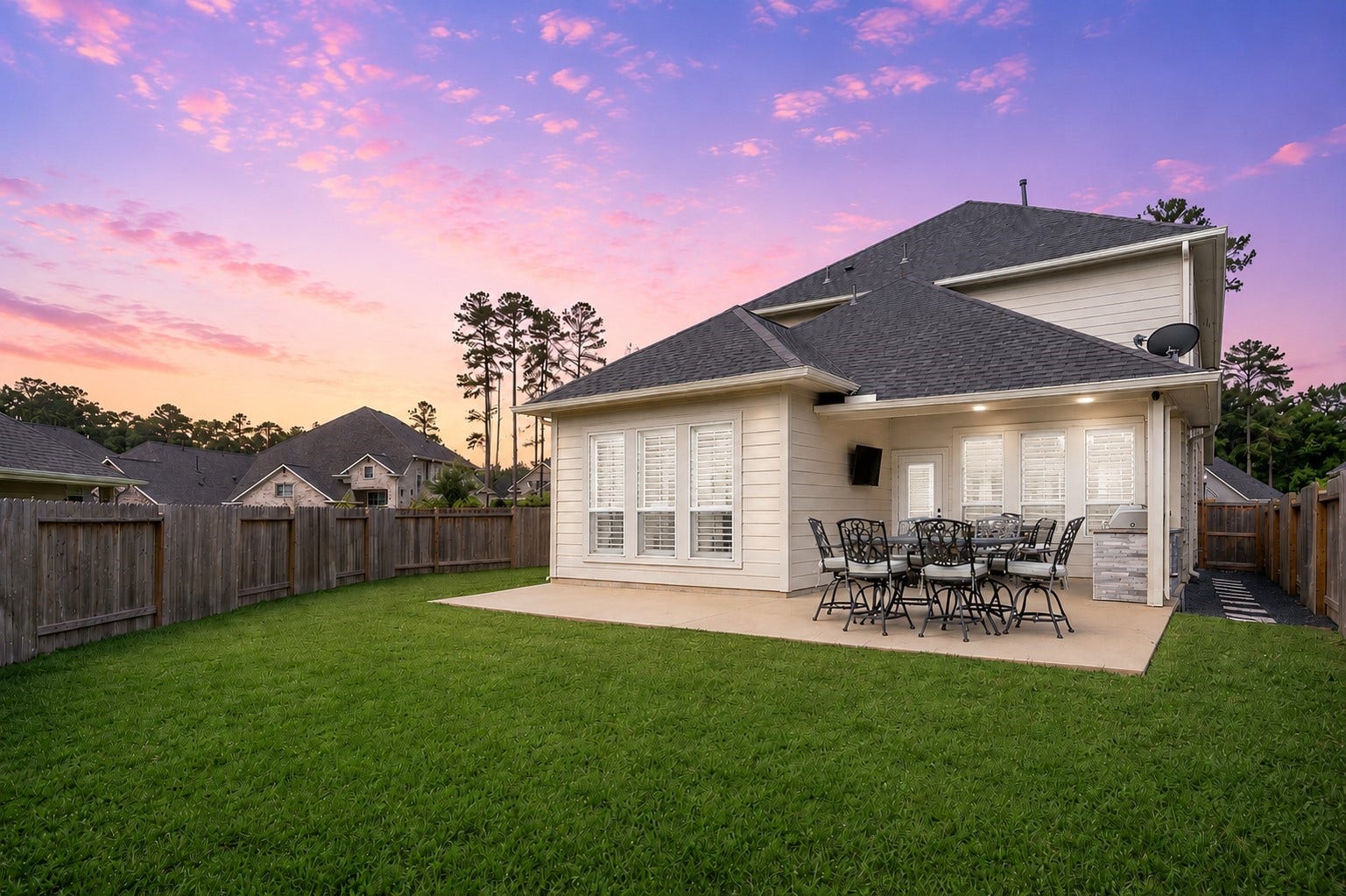 304 Mullins Court, Montgomery, TX 77316 The patio was extended making summer nights a breeze with the built-in grill and mounted TV.
