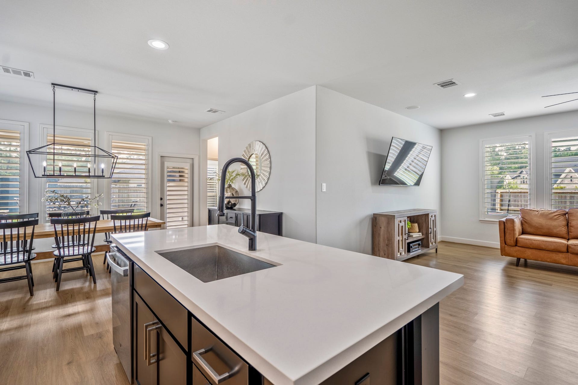 304 Mullins Court, Montgomery, TX 77316 Enjoy this spacious, open-concept design with abundant natural light, overlooking a serene backyard. Perfect for entertaining and family gatherings.