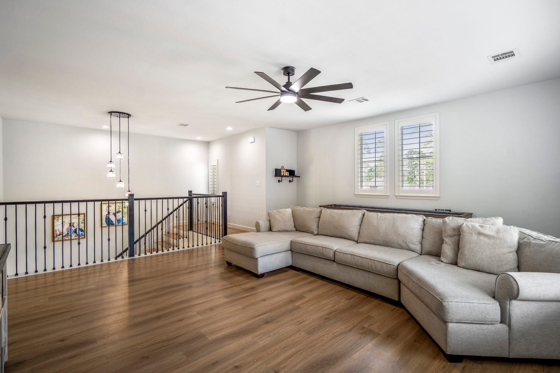 304 Mullins Court, Montgomery, TX 77316 Same flex space but different view, highlighting the upgraded railing for an added touch.