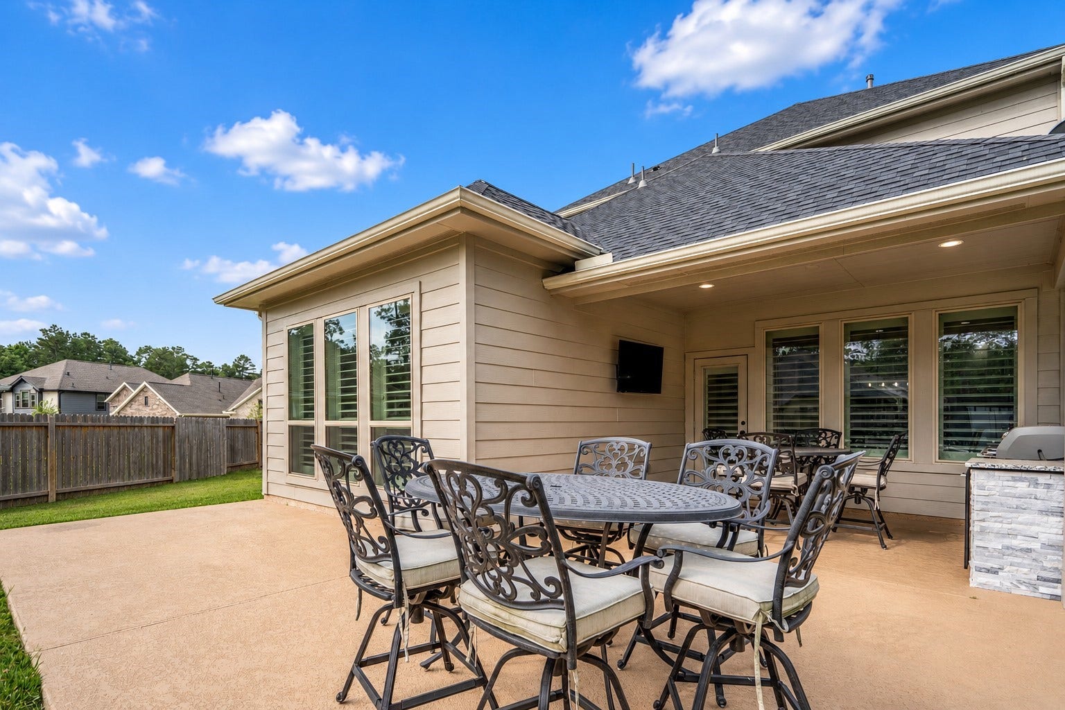 304 Mullins Court, Montgomery, TX 77316 Appreciate the patio extension in this photo, giving you ample space to unwind your days.