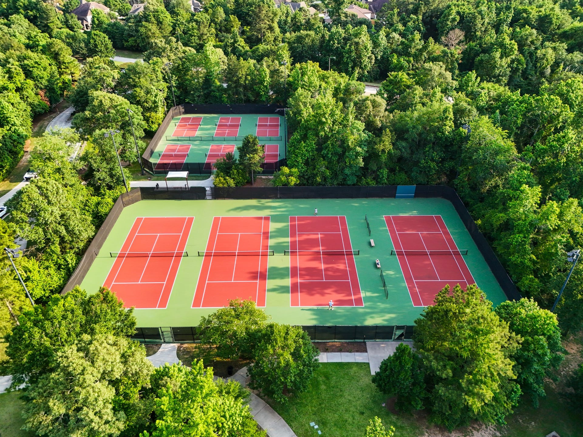 304 Mullins Court, Montgomery, TX 77316 Multiple tennis courts offering a serene surrounding to stay active.