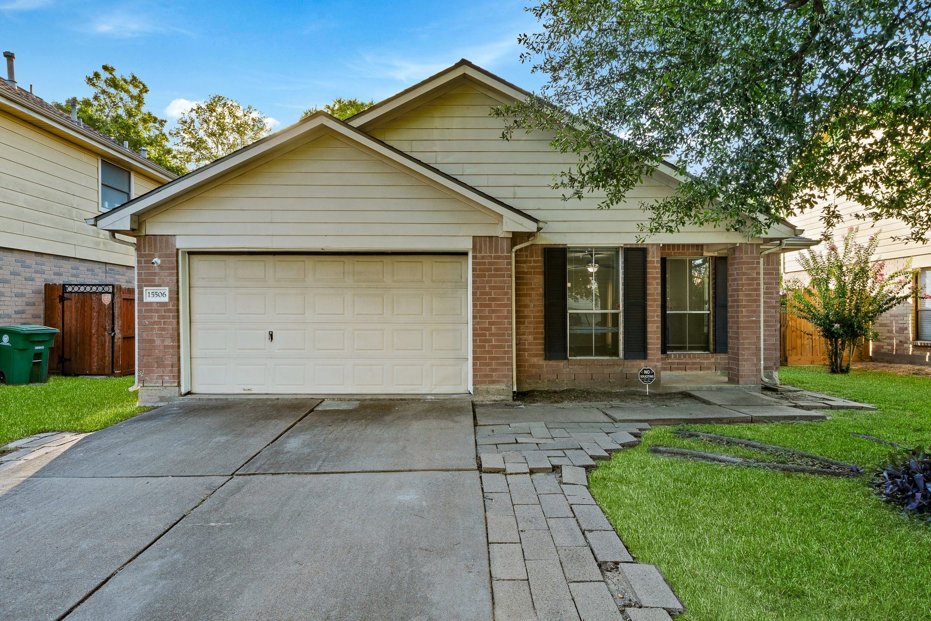 15506 Appleridge Drive, Houston, TX 77489 Charming single-story home featuring a classic brick facade, a two-car garage, and a welcoming front porch. The manicured lawn and mature tree enhance its curb appeal.