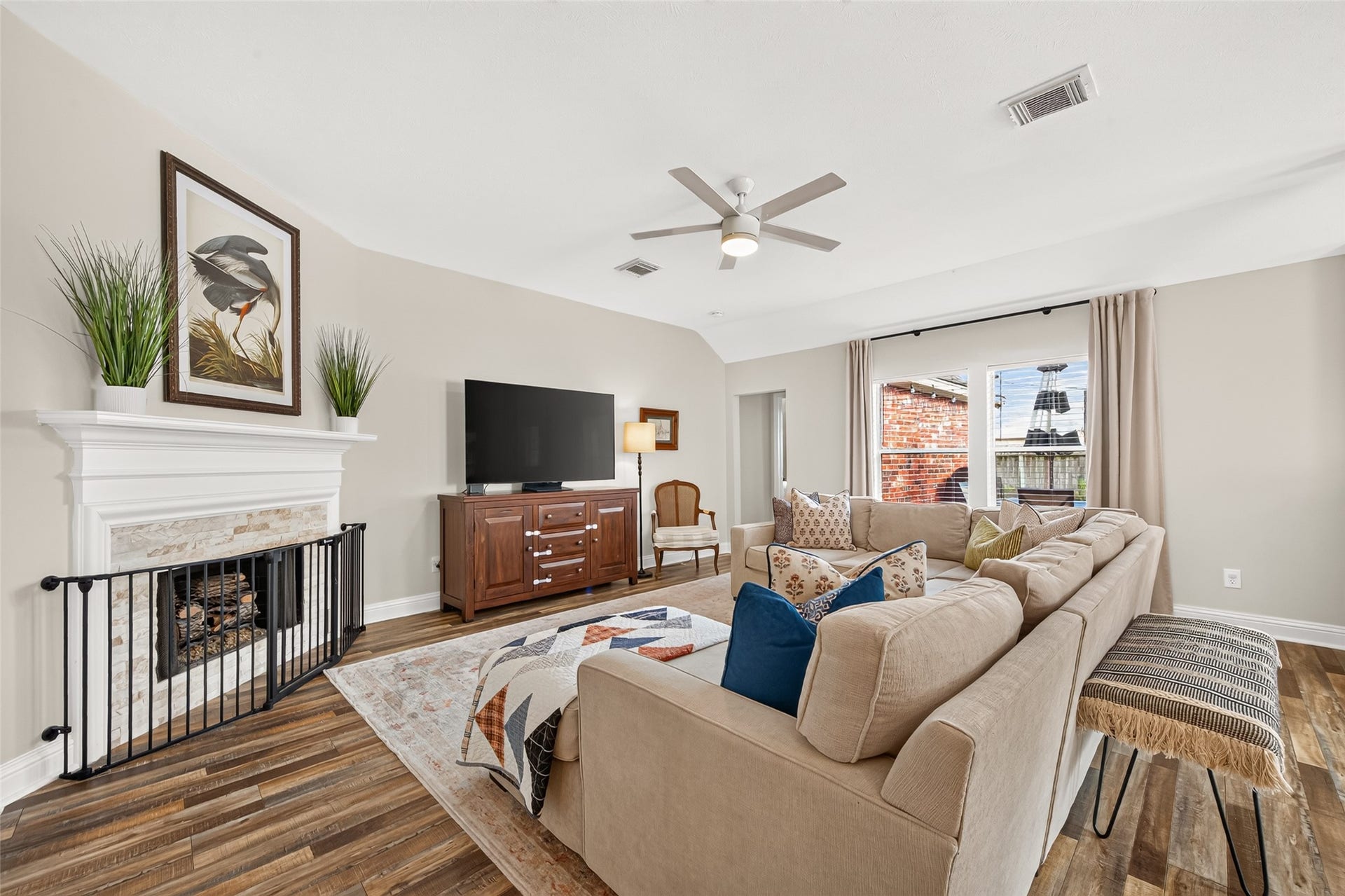 At the heart of the home lies this spacious, light-filled living room designed for relaxed everyday living and effortless entertaining.