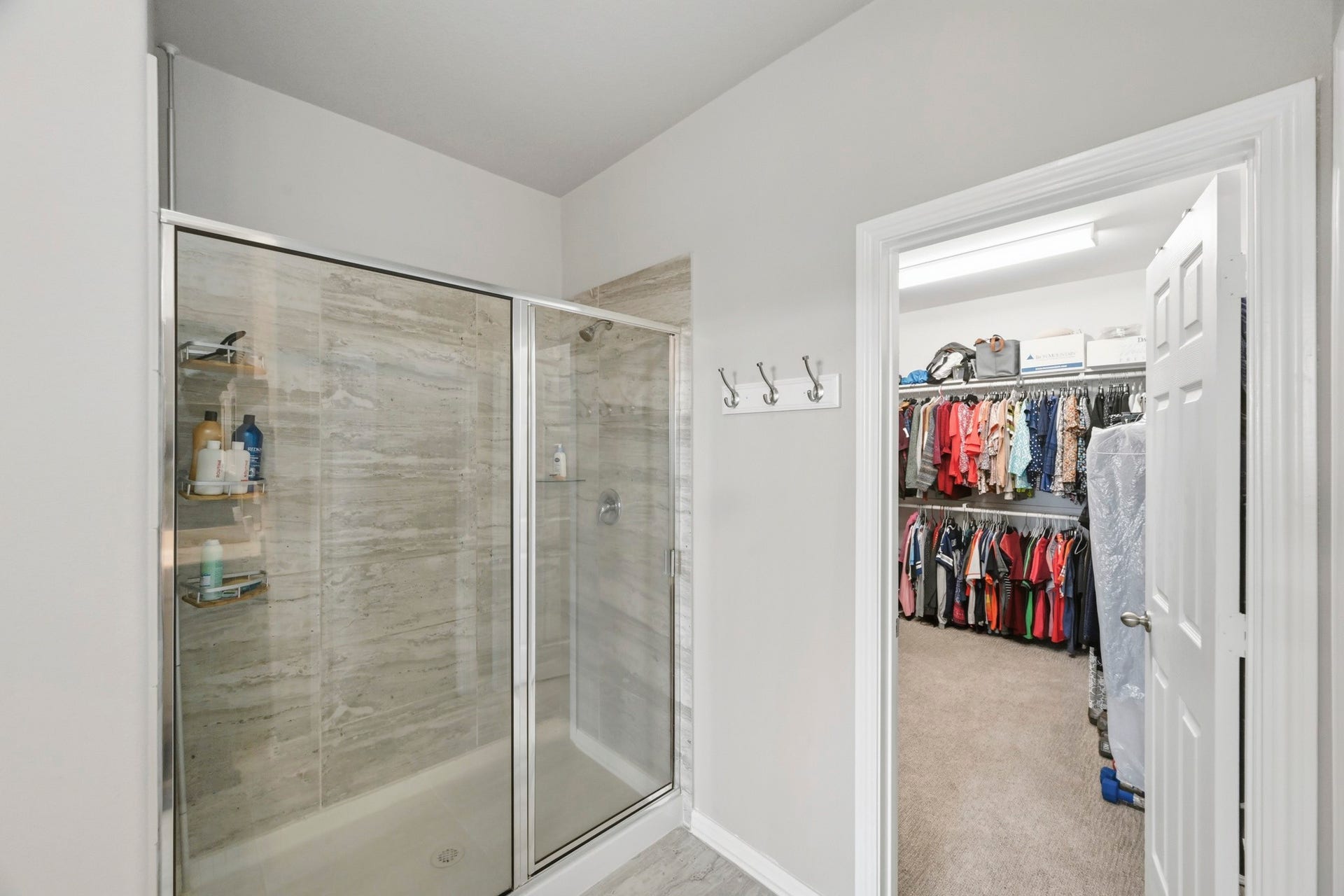 26103 Ridgelawn Drive, Richmond, TX 77406 Spa-inspired primary bath with oversized shower