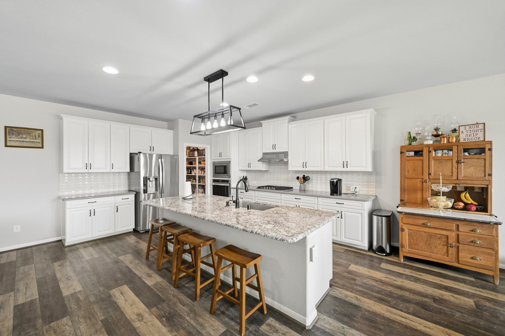 26103 Ridgelawn Drive, Richmond, TX 77406 Island kitchen with quartz and granite countertops
