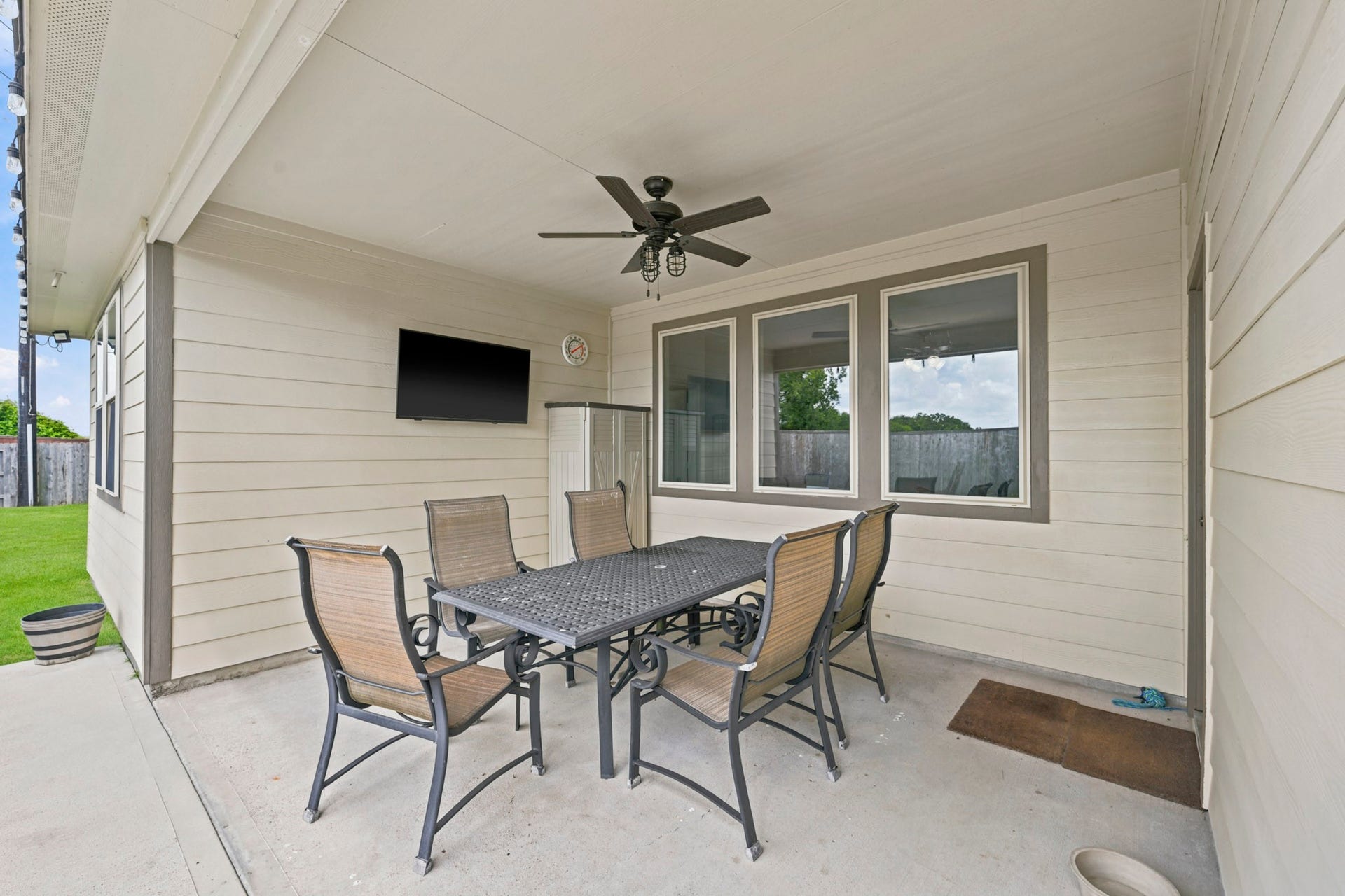 26103 Ridgelawn Drive, Richmond, TX 77406 Extended covered patio for year-round entertaining