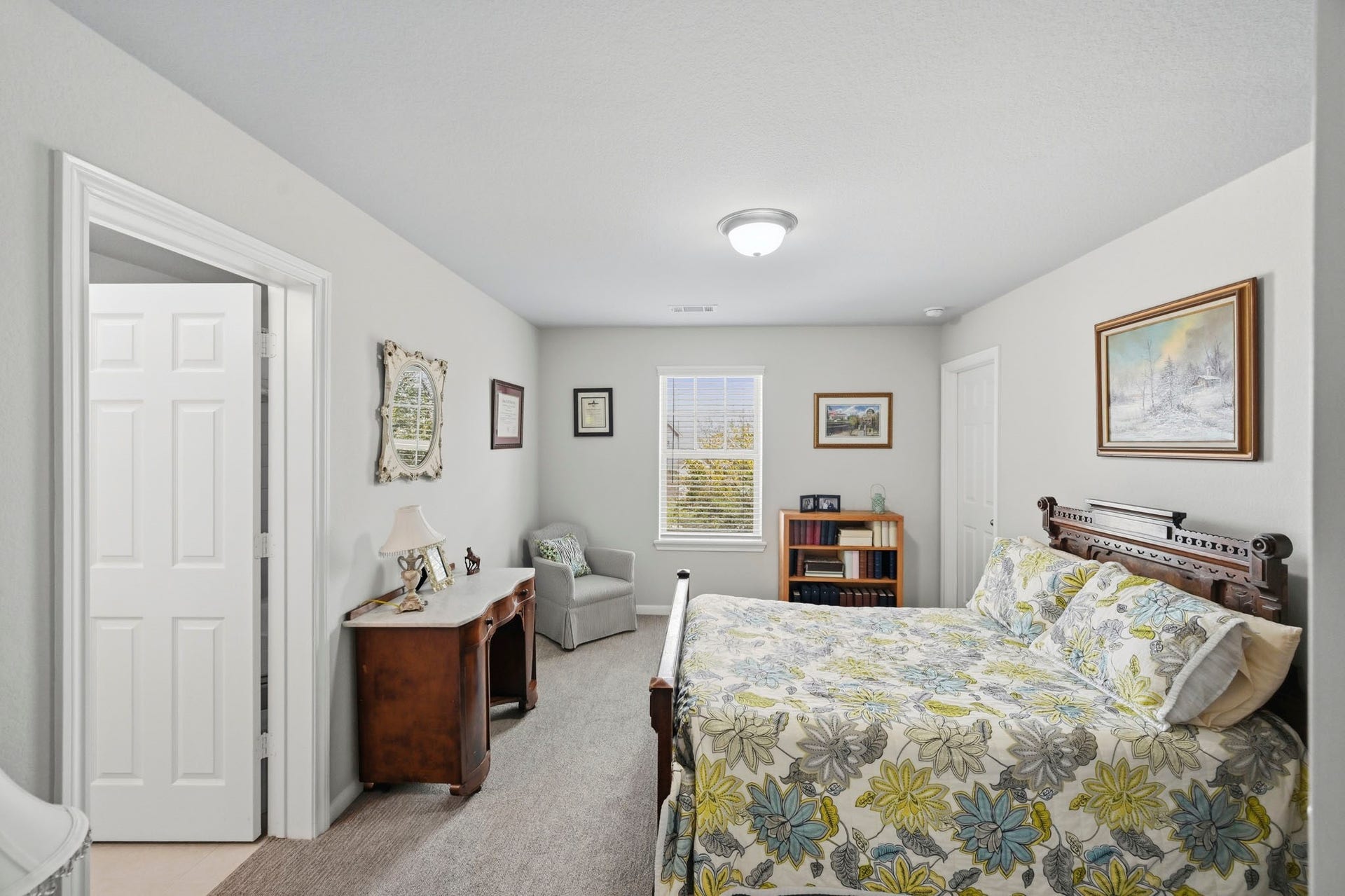 26103 Ridgelawn Drive, Richmond, TX 77406 Comfortable guest bedroom with natural light