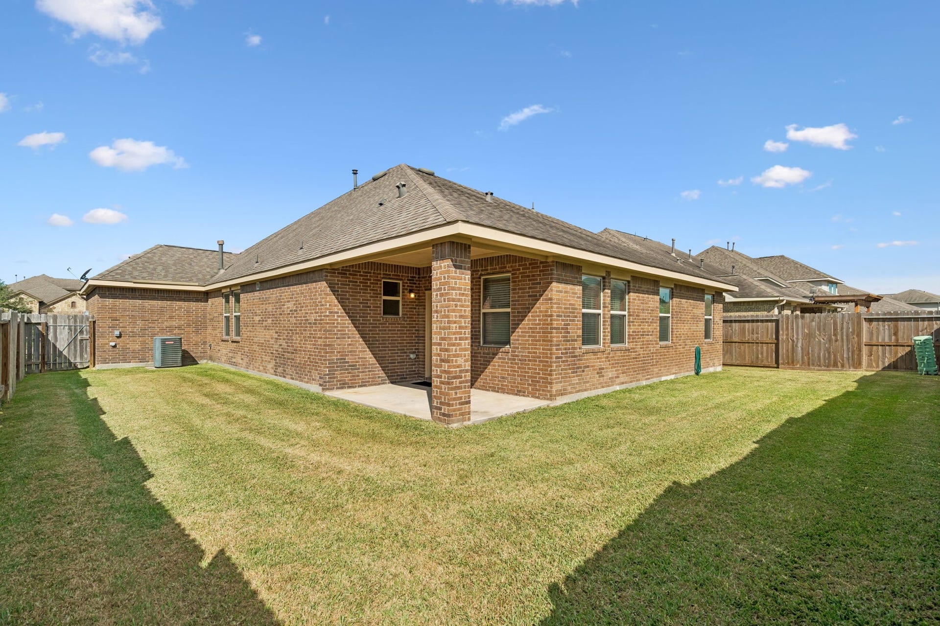 422 Stockport Drive, League City, TX 77573 Plenty of open green space offers flexibility for outdoor entertaining, gardening or creating your own backyard retreat