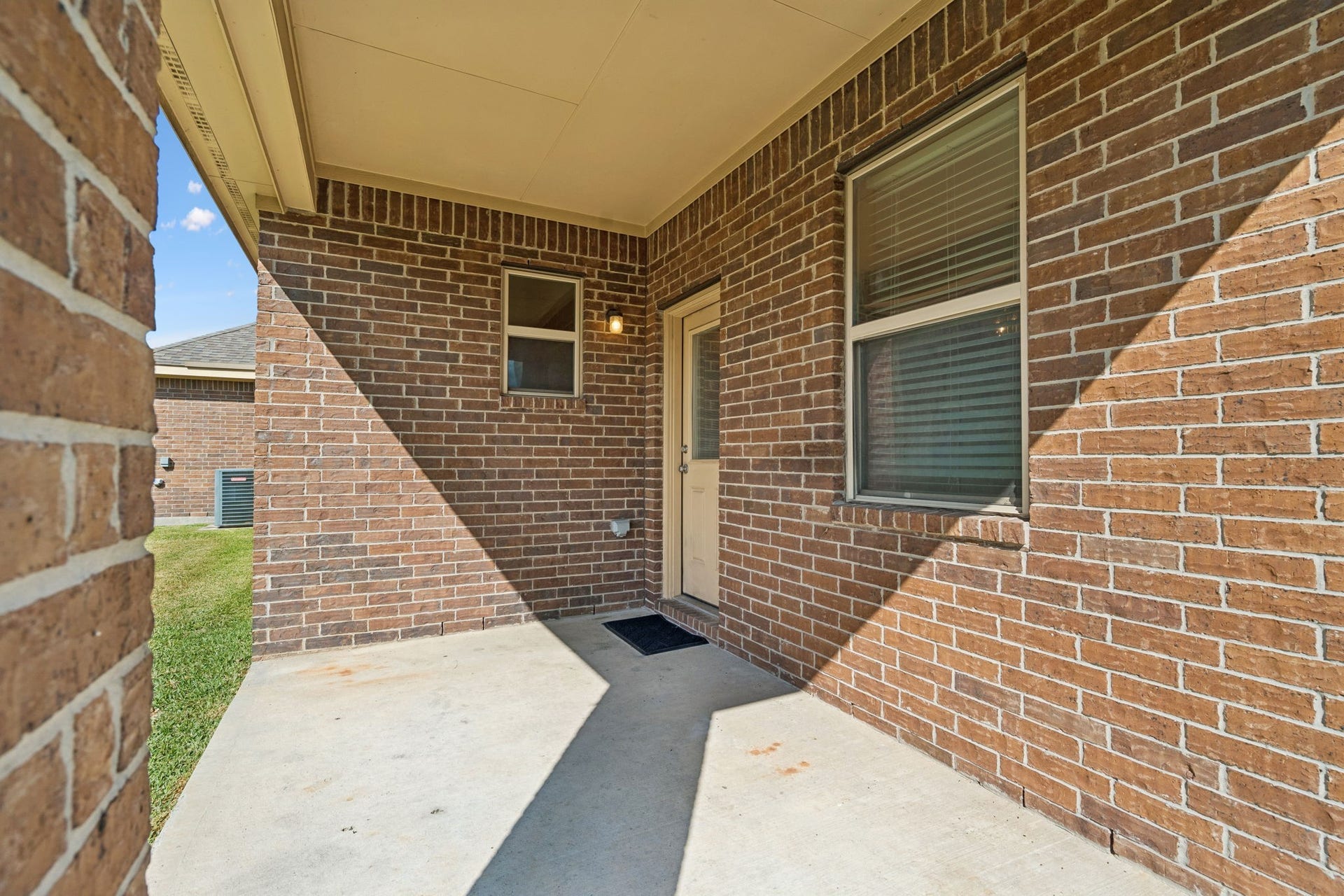 422 Stockport Drive, League City, TX 77573 The brick-surrounded patio offers a comfortable setting for outdoor dining, a quiet morning coffee or simply enjoying some fresh air