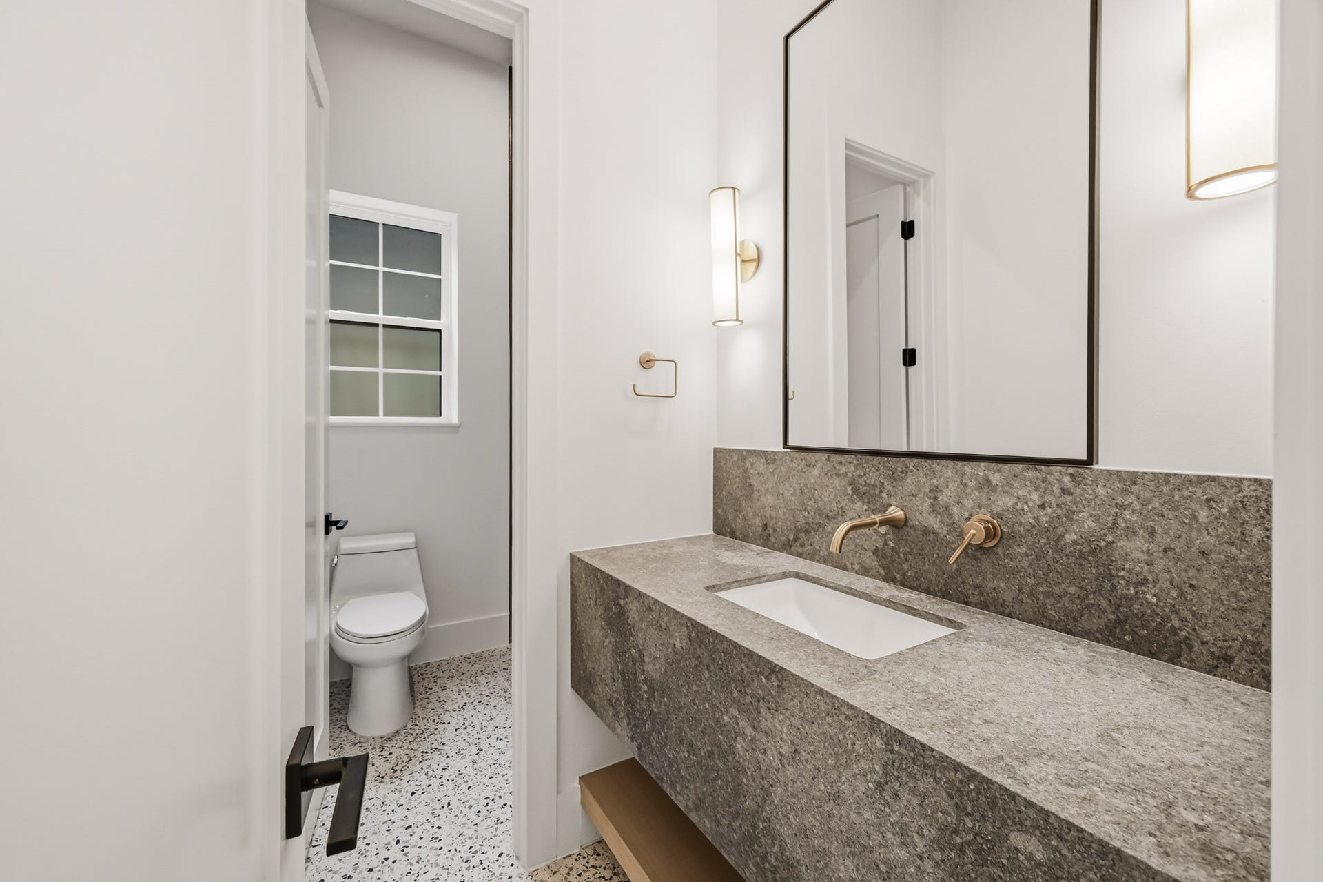 The full, hall bath serves the entire downstairs!
