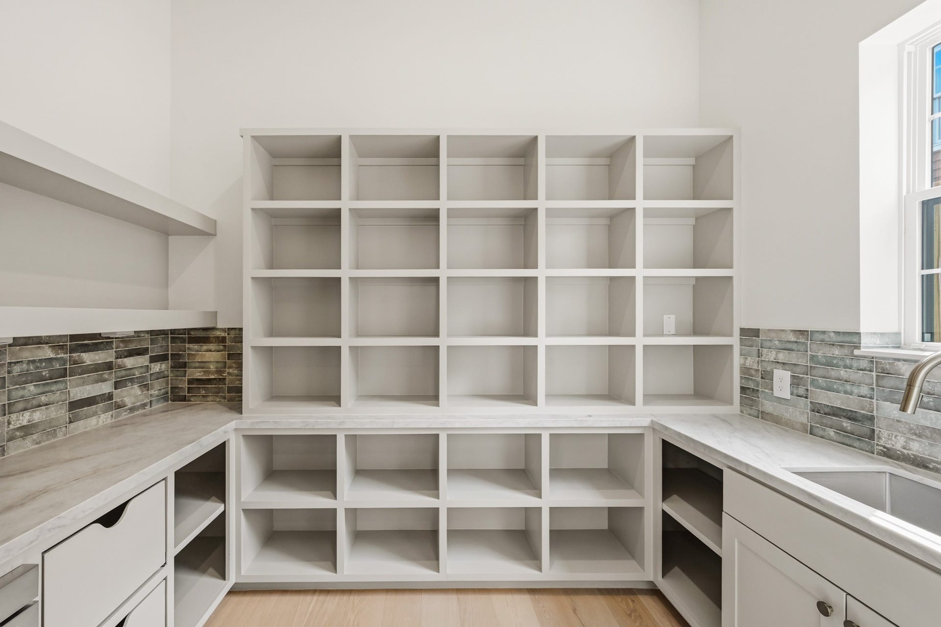 Tucked behind the kitchen is this fantastic scullery!