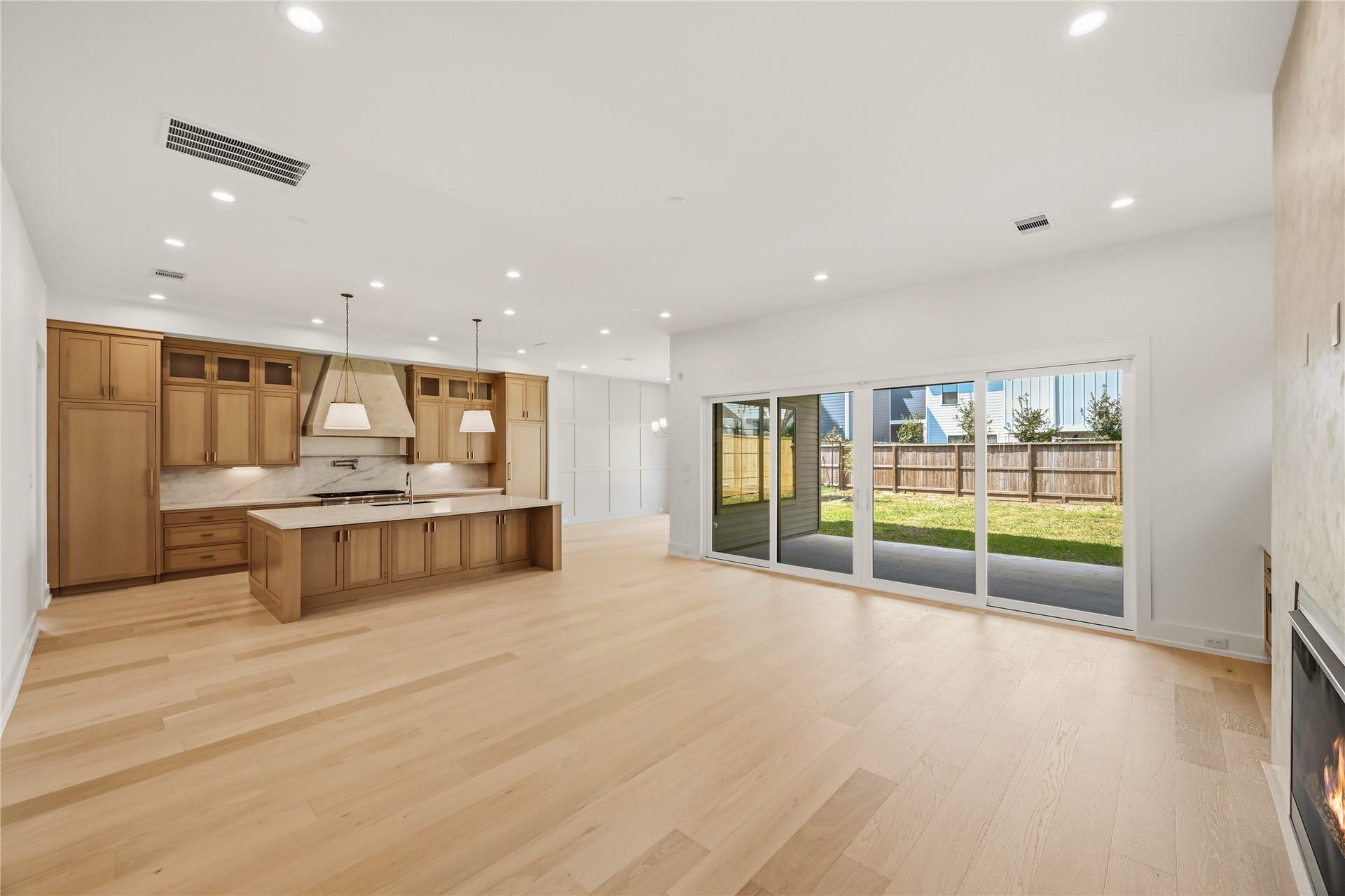 Open concept, massive yard, covered patio, and organic modern finishes!