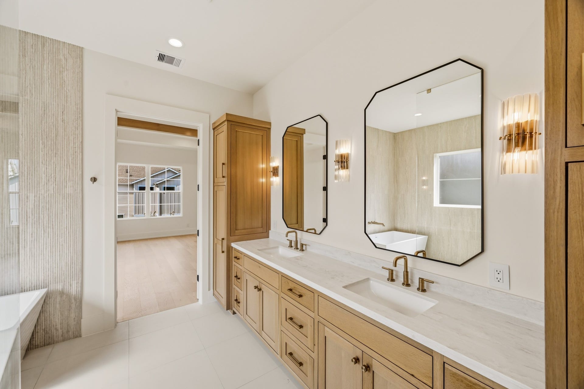 Double vanities, double linen cabinets, and tons of counter space!