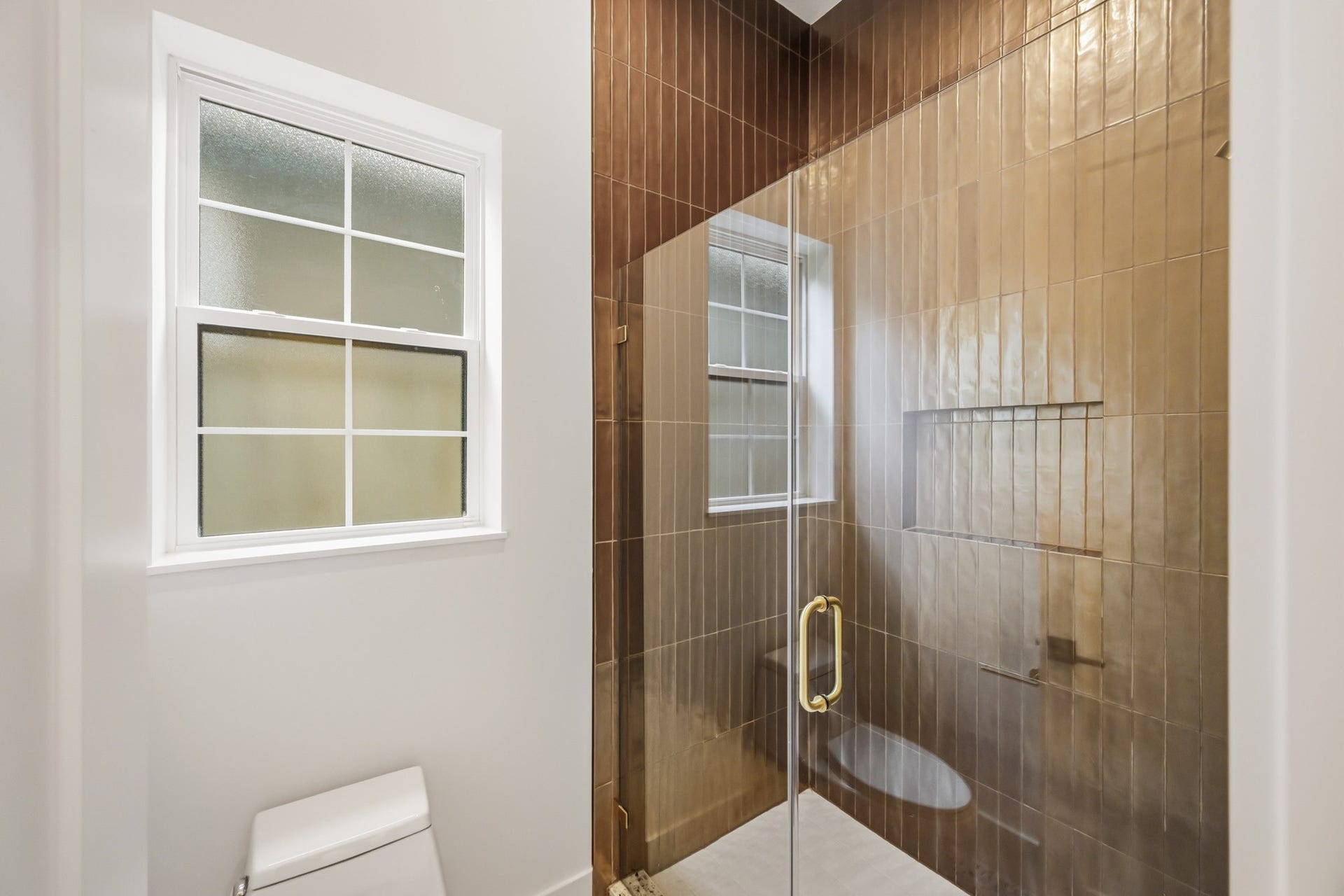 Stunning floor to ceiling tile in the walk-in shower!
