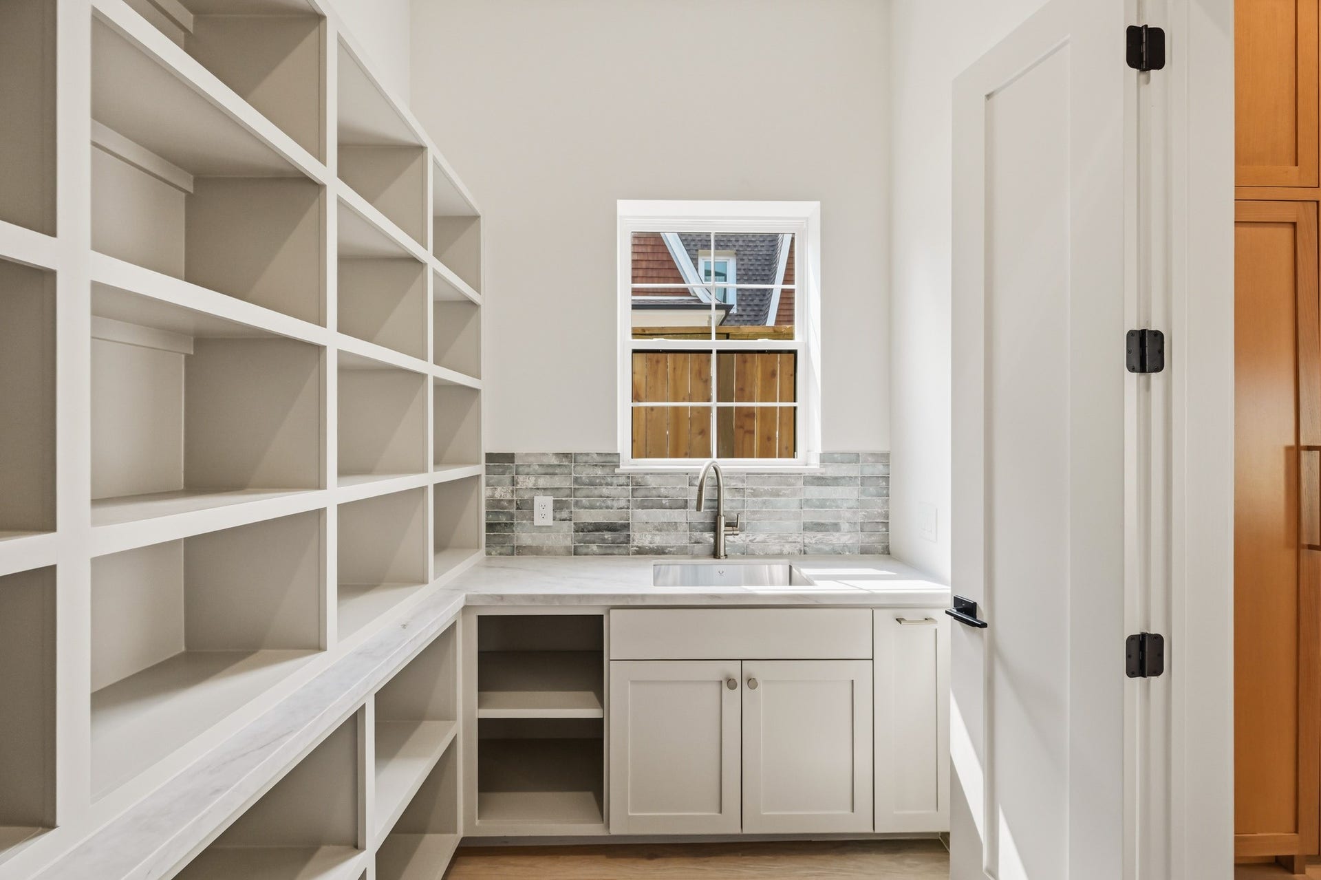 It enjoys a second sink and natural light!