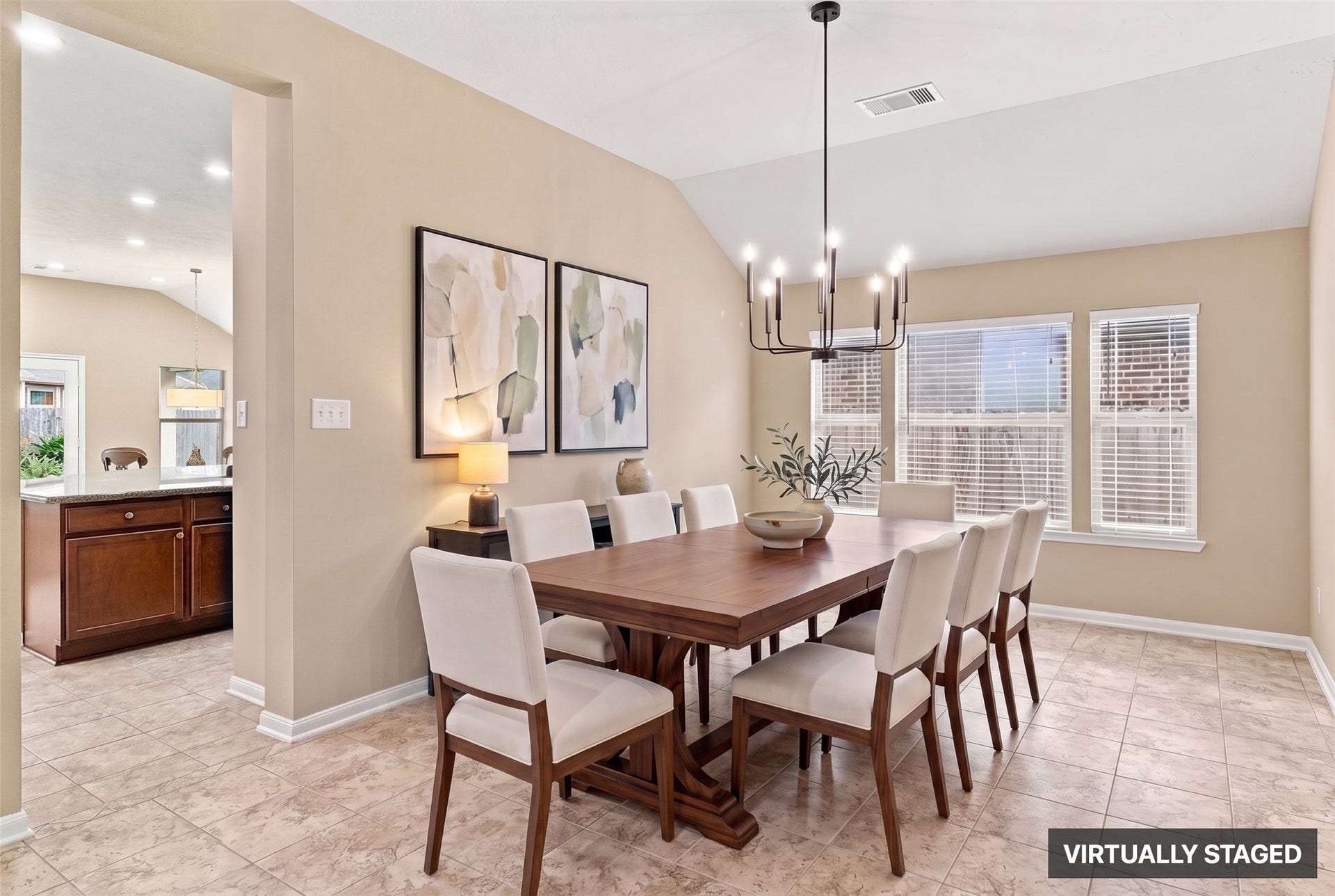24015 Orange Orchard Lane, Katy, TX 77493 Virtually staged. Dining opens toward the kitchen on one side, so serving a holiday dinner never means a long walk.