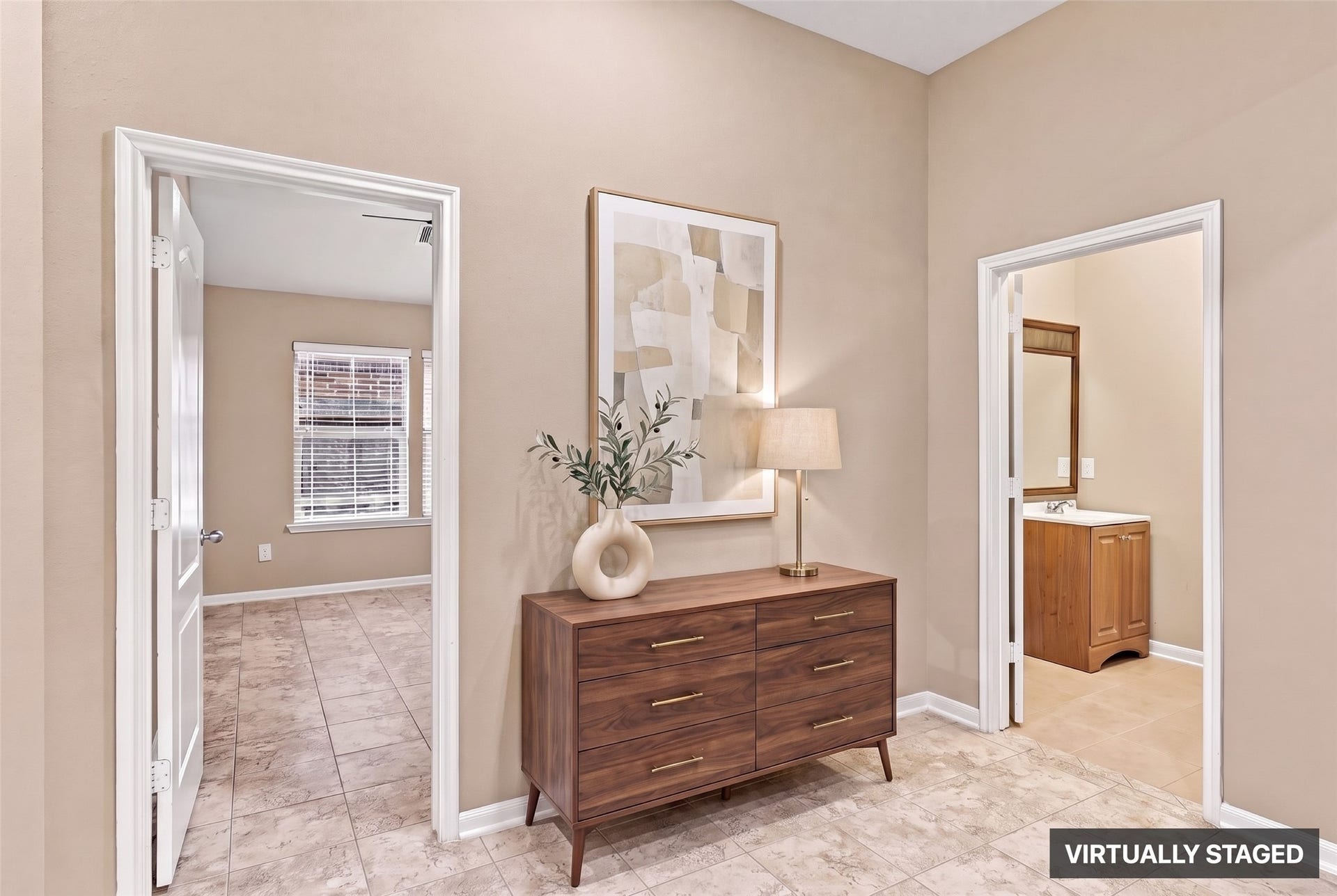24015 Orange Orchard Lane, Katy, TX 77493 Virtually staged. A short hall links a secondary bedroom with a full bath, keeping guests comfortable and out of the main living areas.