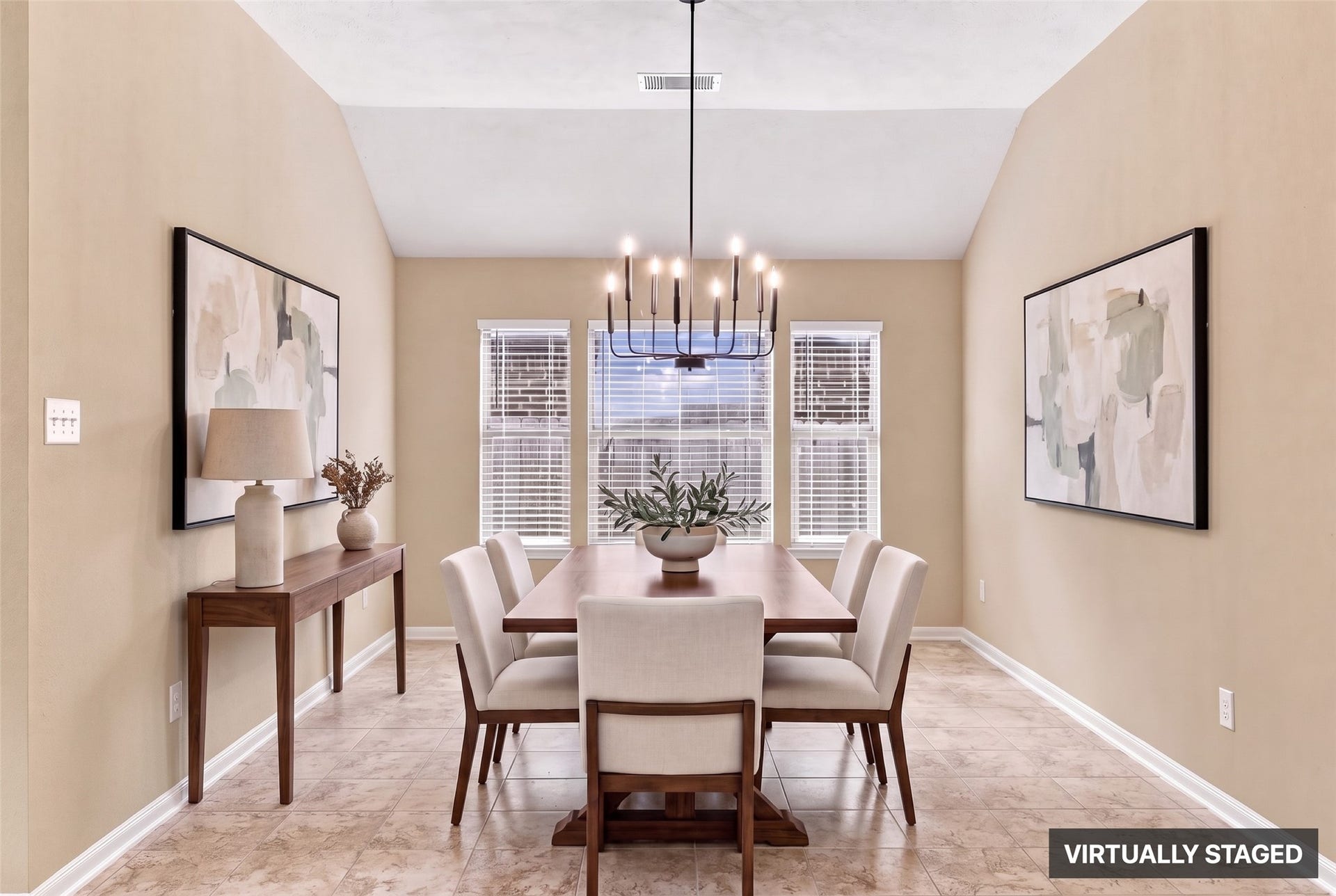 24015 Orange Orchard Lane, Katy, TX 77493 Virtually staged. A formal dining room with a raised ceiling and a full wall of windows, easily sized for a table for eight.