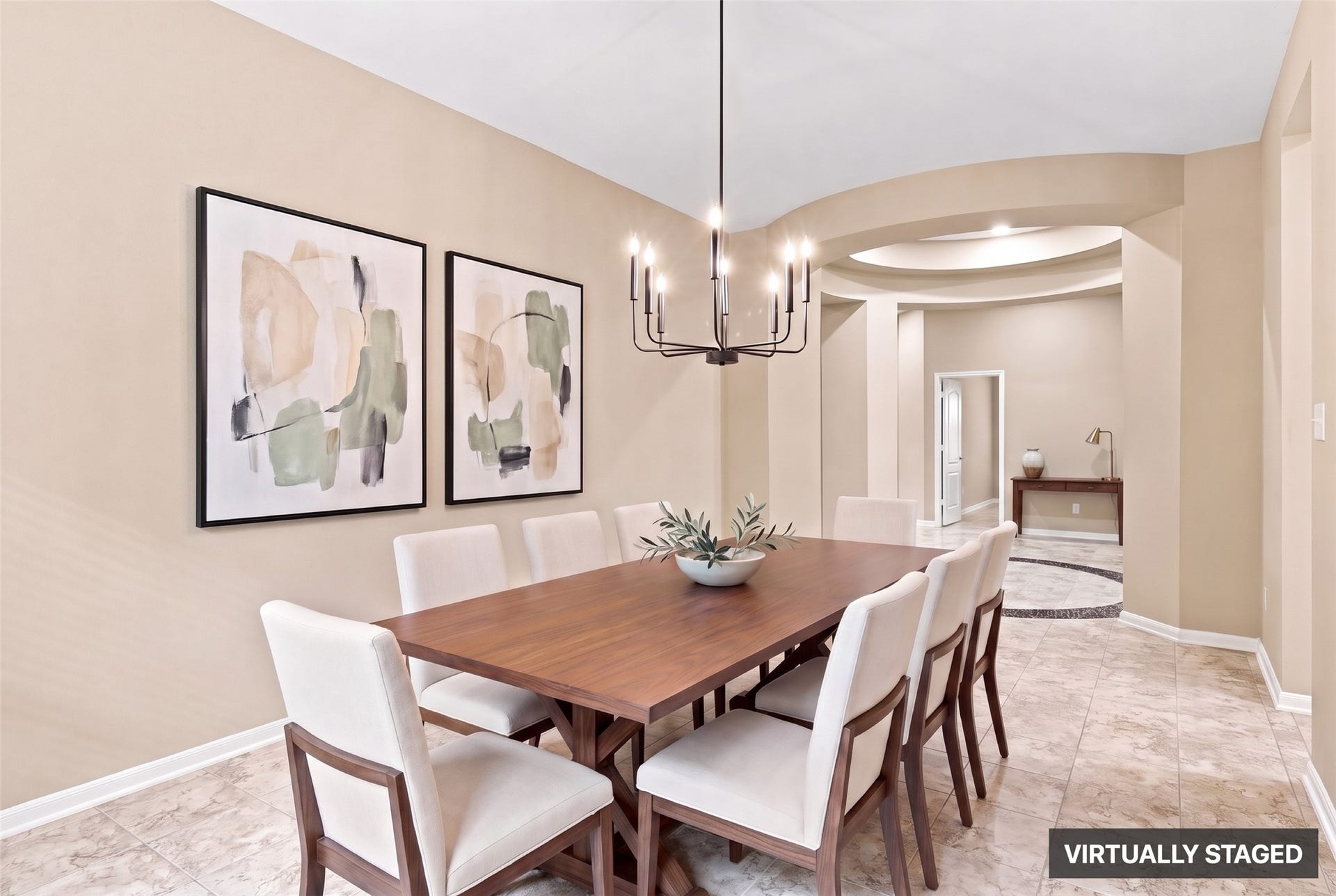 24015 Orange Orchard Lane, Katy, TX 77493 Virtually staged. Tile carries from the dining room back through the rotunda foyer and on into the family room and kitchen - one continuous, easy-care floor.