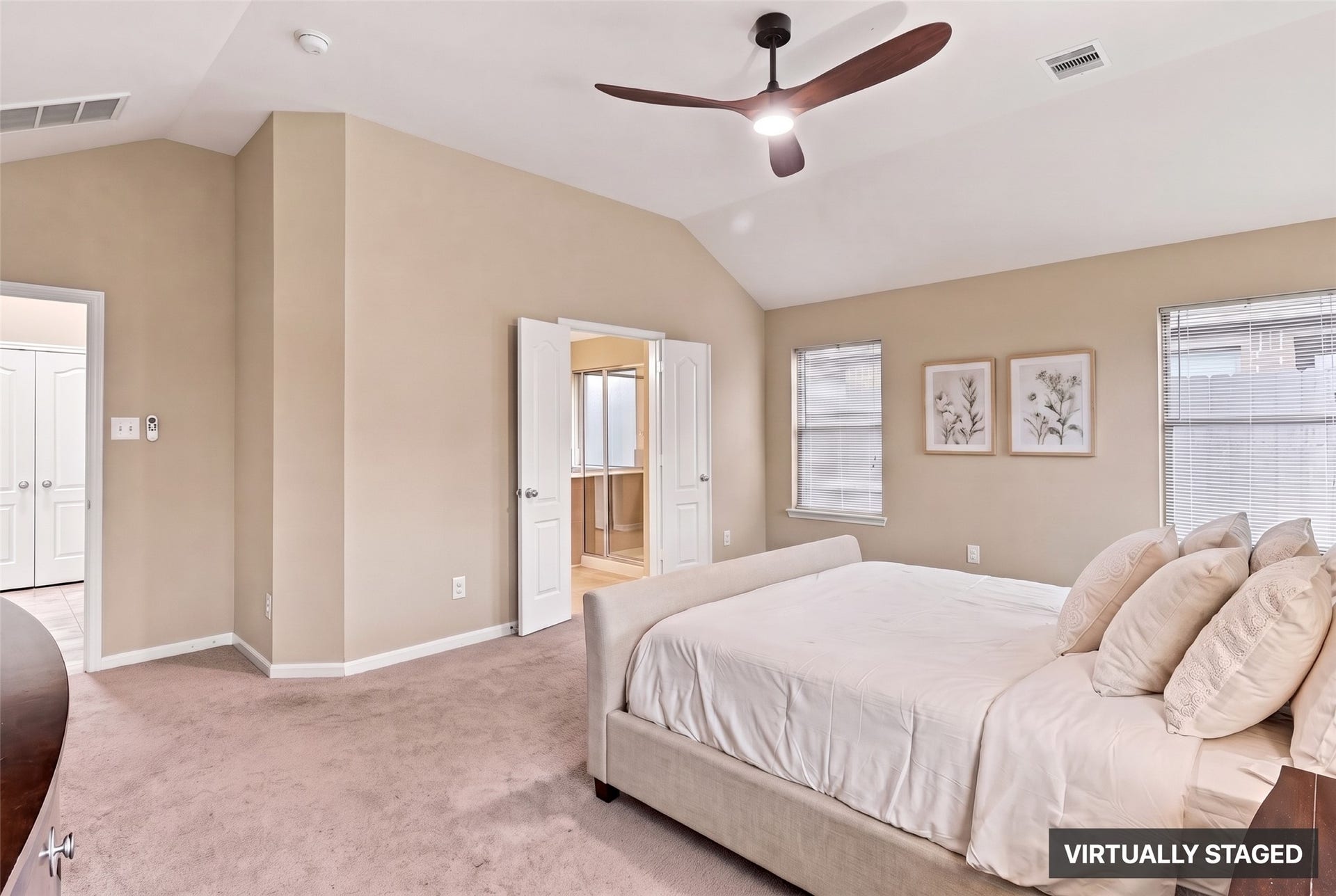 24015 Orange Orchard Lane, Katy, TX 77493 Virtually staged. Double doors lead from the primary bedroom into the bath, keeping the suite private from the rest of the home.