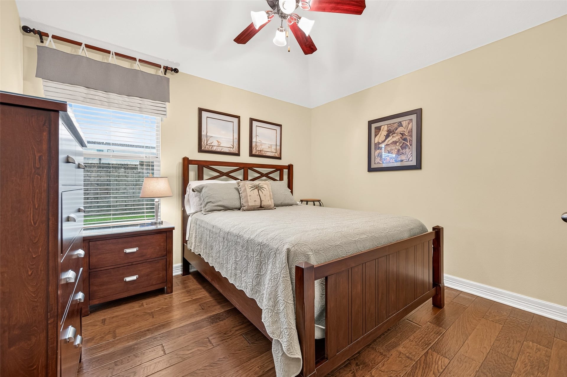 211 Little Summer Drive, Rosenberg, TX 77469 Fourth bedroom with hardwood floors and a ceiling fan.