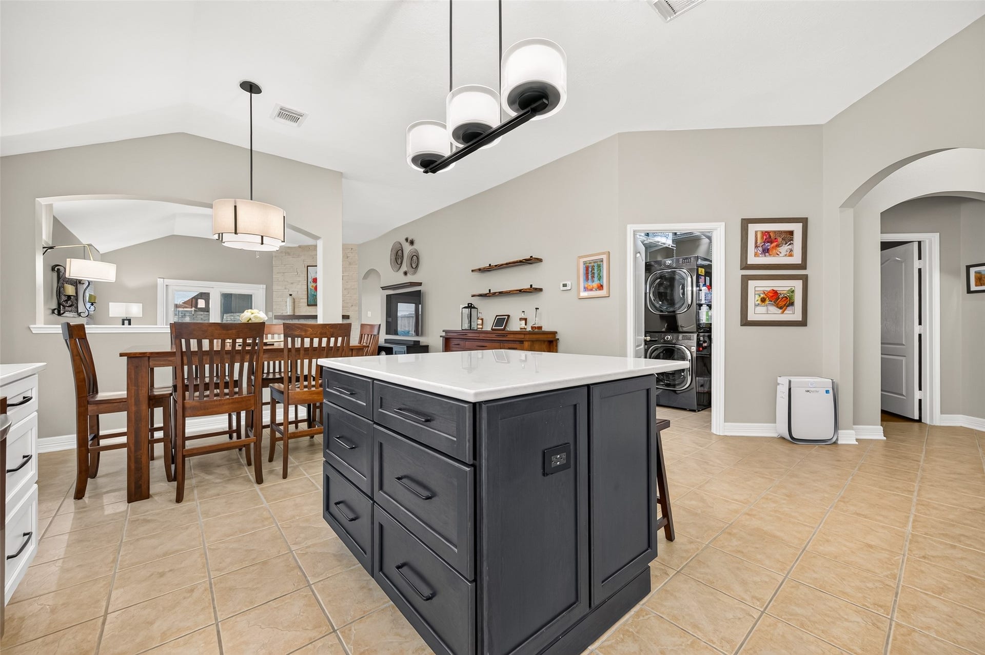 211 Little Summer Drive, Rosenberg, TX 77469 Island with deep pot drawers and soft-close cabinetry - the breakfast area sits just beyond.