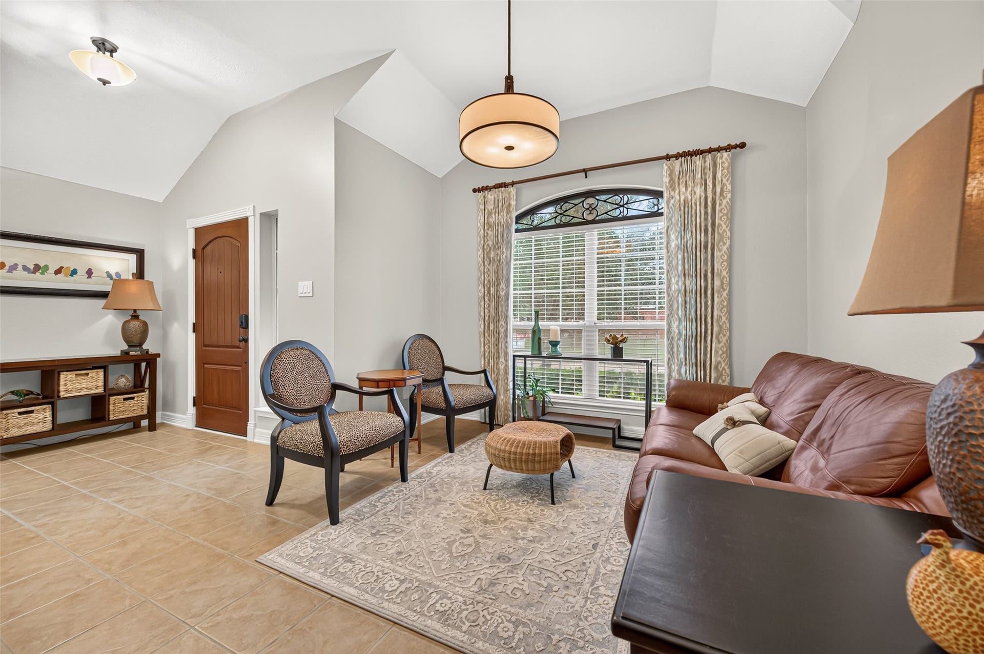 211 Little Summer Drive, Rosenberg, TX 77469 Formal living room with an arched window for lots of natural light.