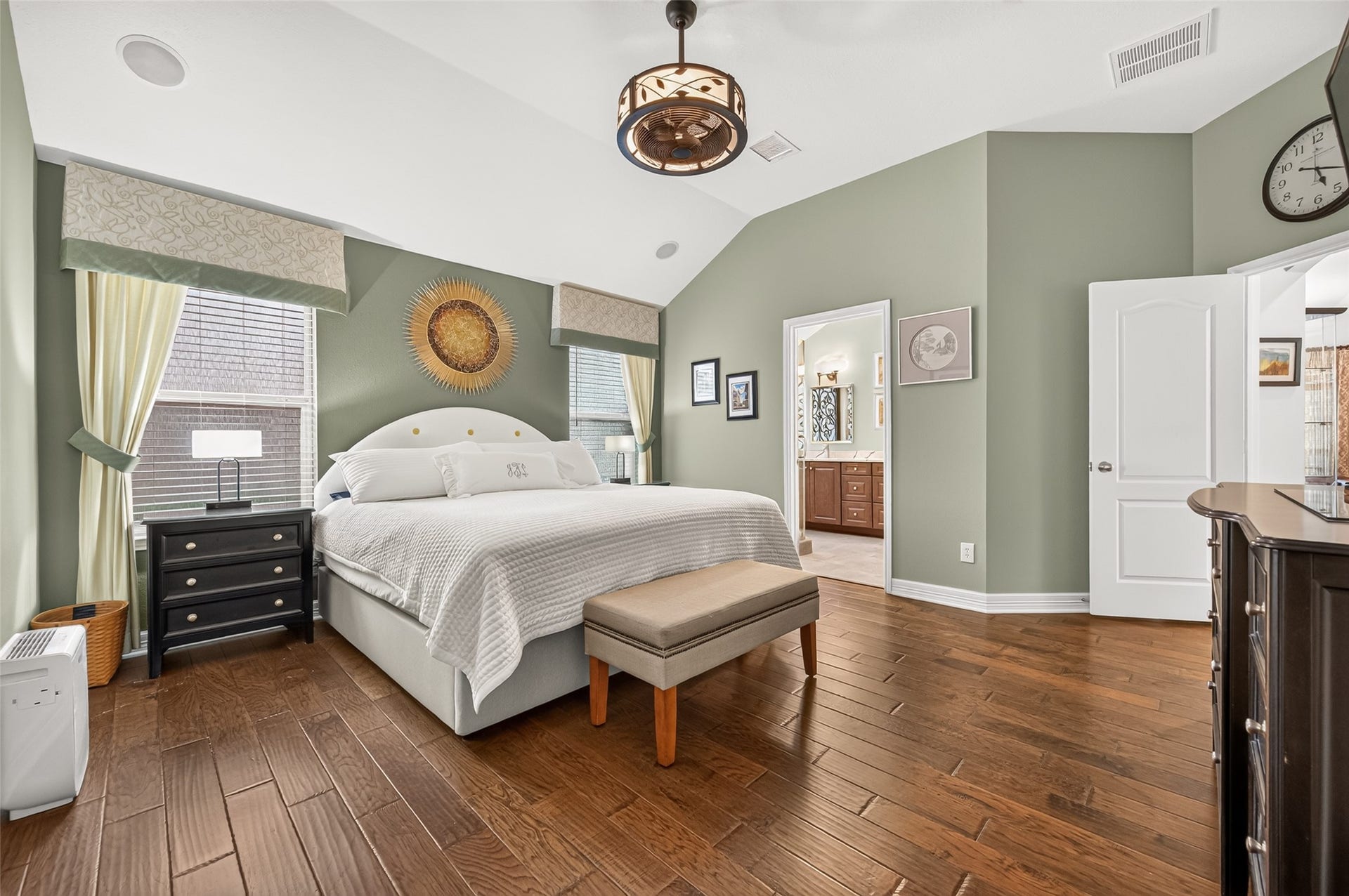 211 Little Summer Drive, Rosenberg, TX 77469 Primary retreat with an updated light and fan fixture, hardwood floors and private access to the remodeled bath.