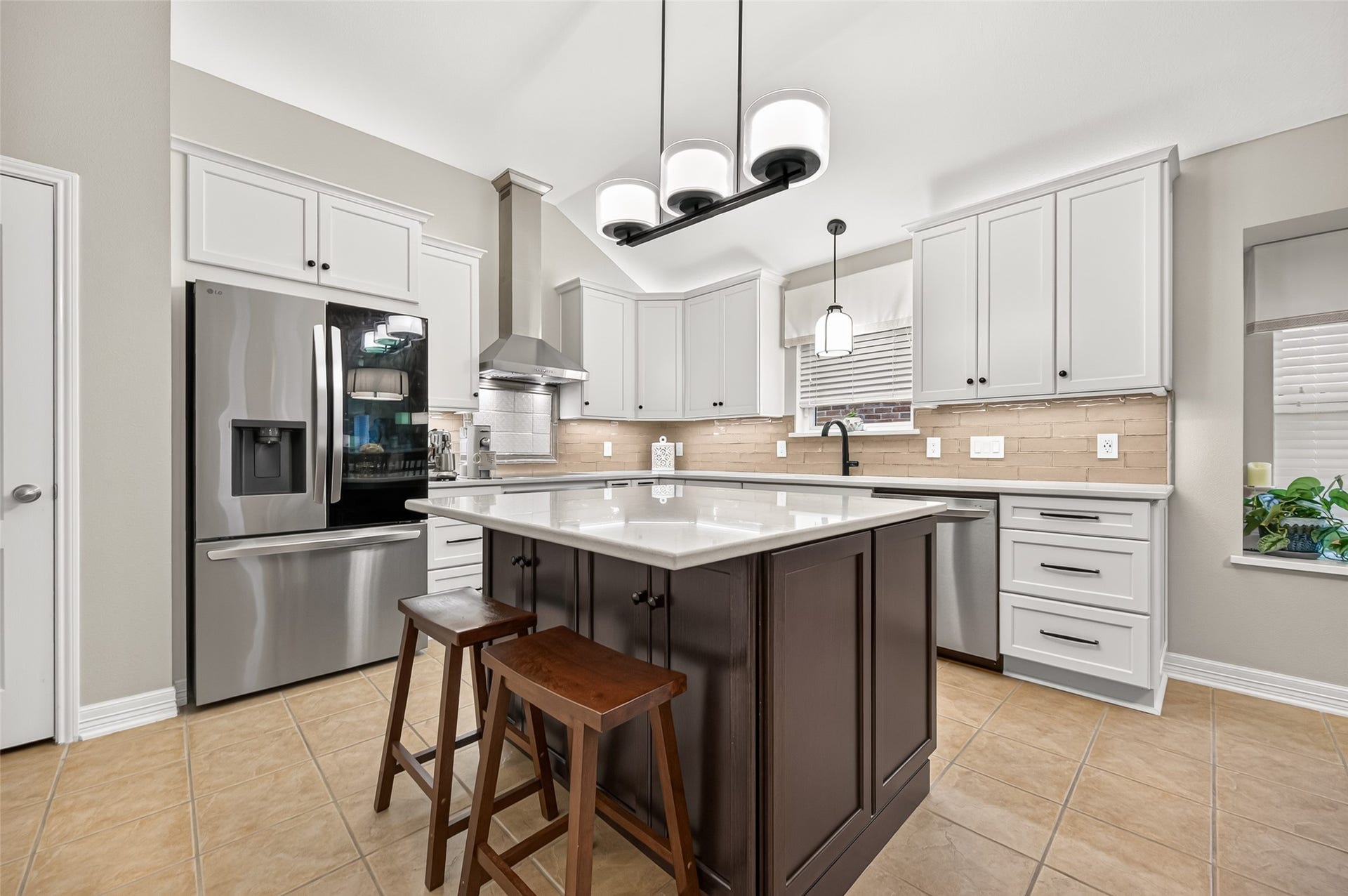 211 Little Summer Drive, Rosenberg, TX 77469 Enlarged island with storage on both sides and seating for casual meals.