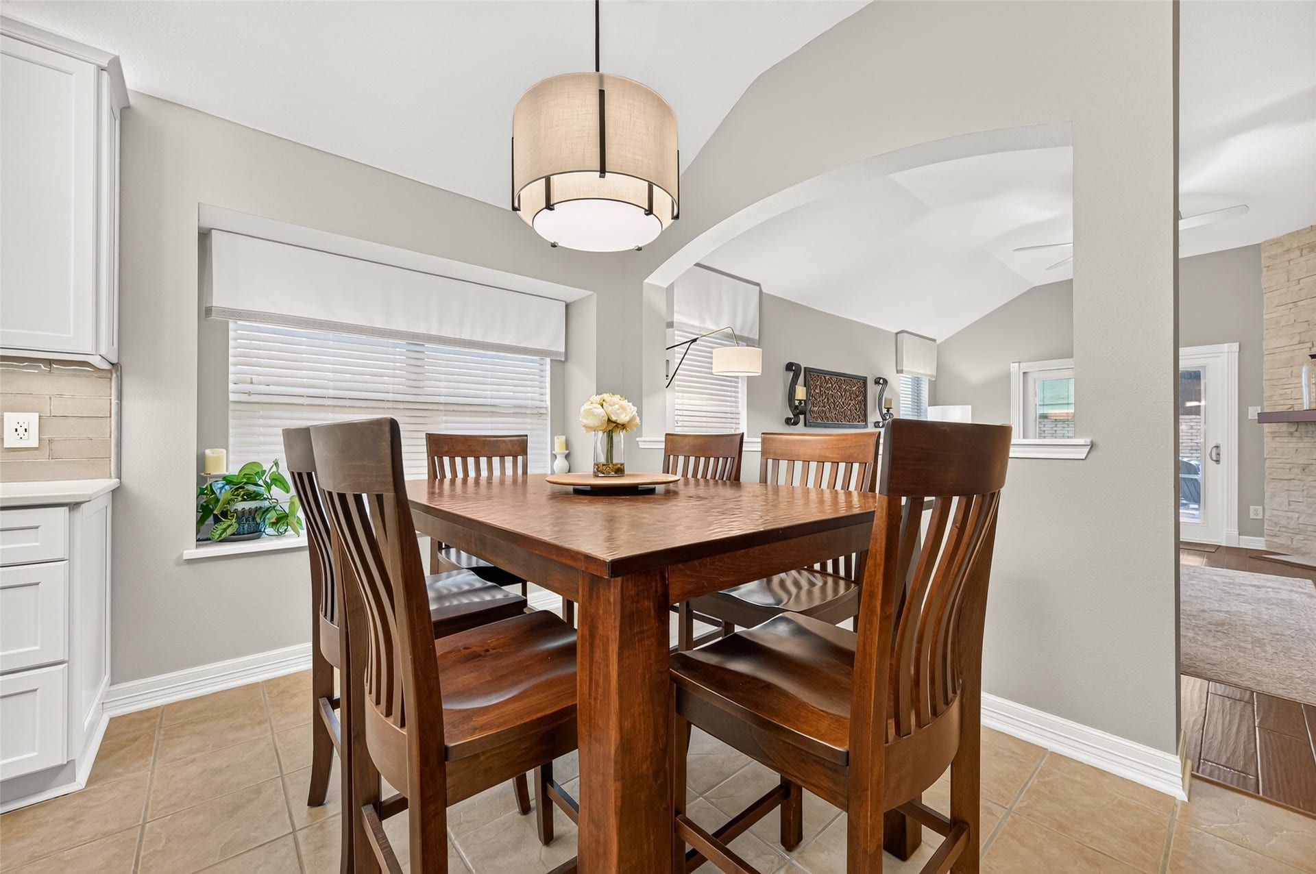 211 Little Summer Drive, Rosenberg, TX 77469 Breakfast area with bright deep set windows and an updated pendant light.