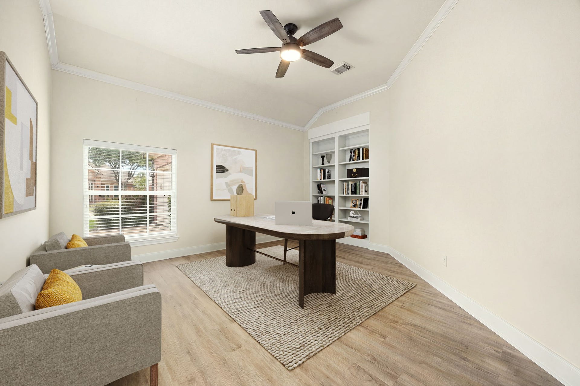 4110 Garden Cove Court, Katy, TX 77494 This dedicated home office space features elegant French doors for productivity and privacy. Designed with handsome wood-look flooring, crisp neutral walls, and a modern ceiling fan, the versatile layout offers ample room for a large executive desk, storage, and cozy client seating beneath a bright window looking out to the front yard.