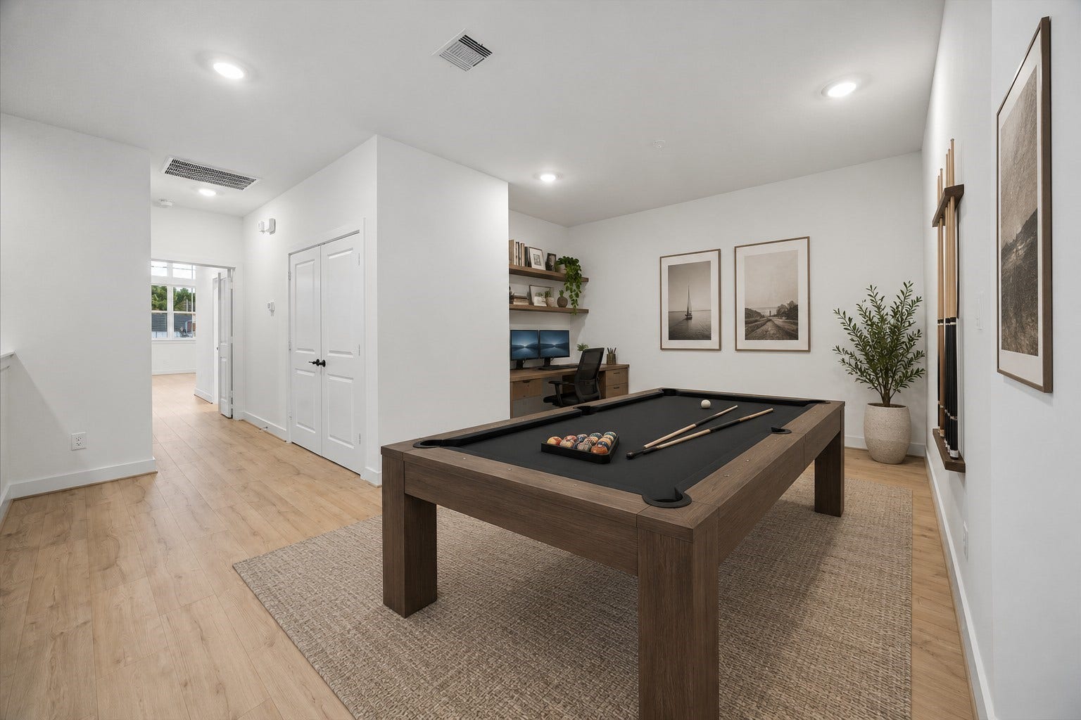 5018 Schuler Street, Houston, TX 77007 Digitally staged versatile flex room showcasing the possibilities for a home office and game room, complete with a pool table and dedicated workspace.