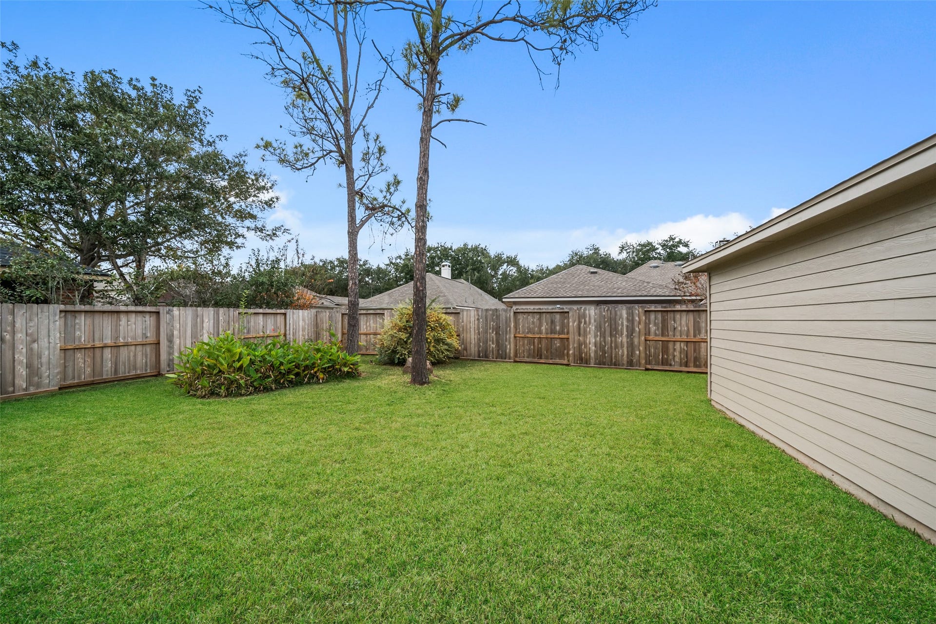 1123 Summer Brook, Sugar Land, TX 77479 A spacious backyard offers endless possibilities for outdoor living, from relaxing afternoons to weekend gatherings. With open green space and room to personalize, this setting invites you to create your own private outdoor experience right at home.