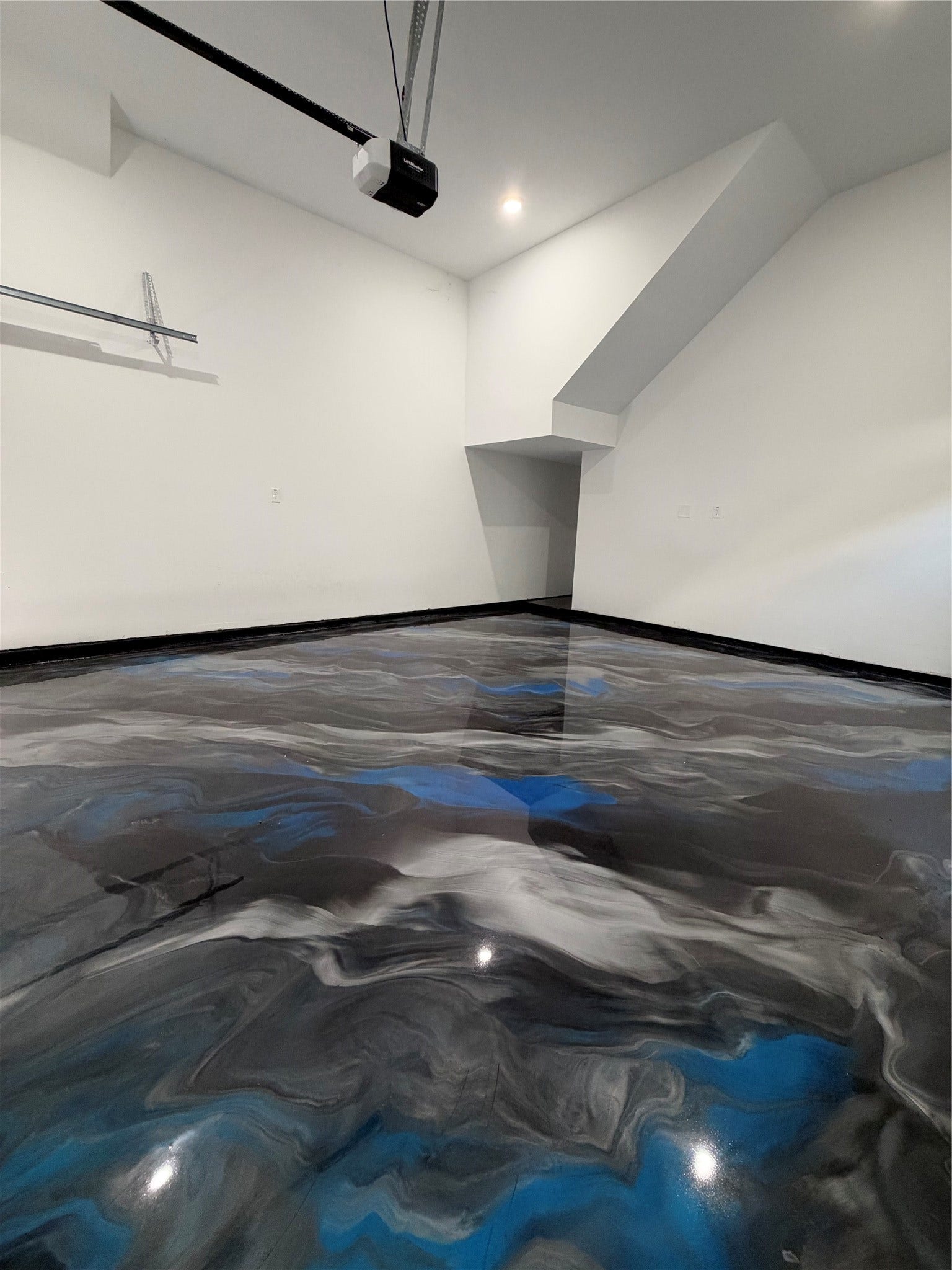 3103 Lelia Street, #B, Houston, TX 77026 Newly custom epoxy flooring in the garage.