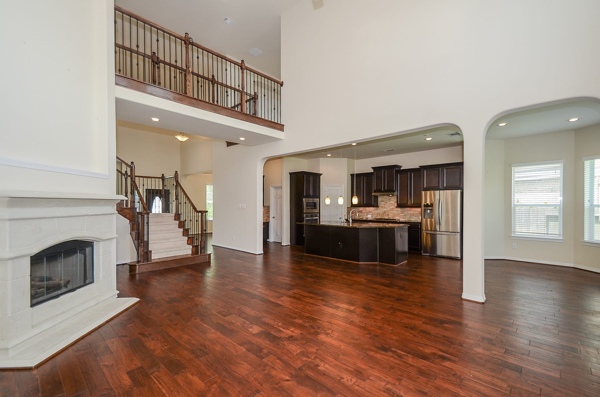27031 Drybank Creek Lane, Katy, TX 77494 Open concept kitchen into the living room.