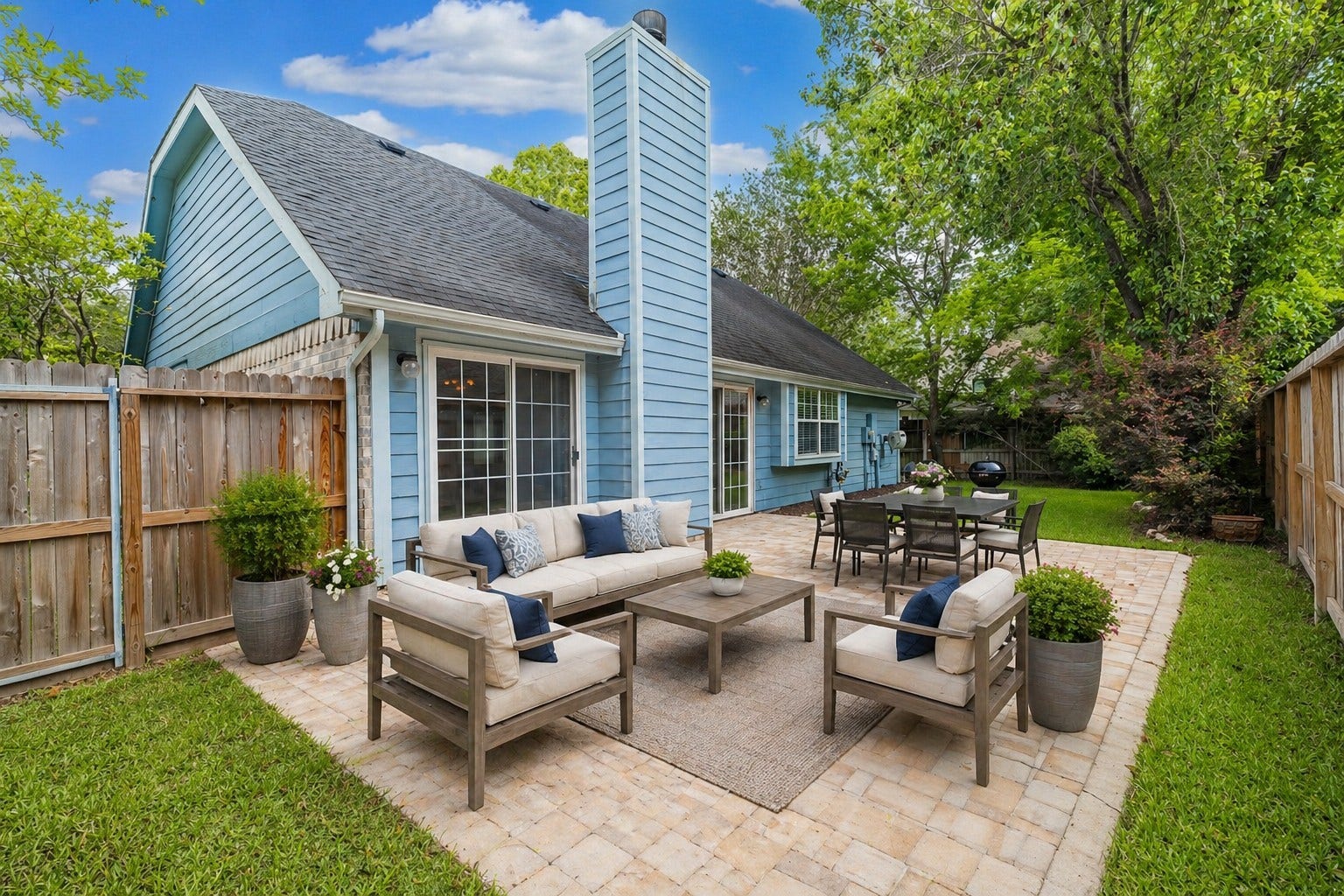 519 E Hillary Circle, Sugar Land, TX 77498 Enjoy outdoor living on the extended, paved patio - Virtually Staged