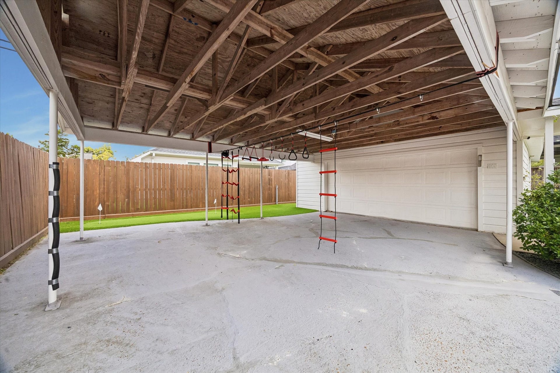 1232 Chantilly Lane, Houston, TX 77018 Two car garage with an additional covered carport provides plenty of space for parking, storage, and everyday convenience.