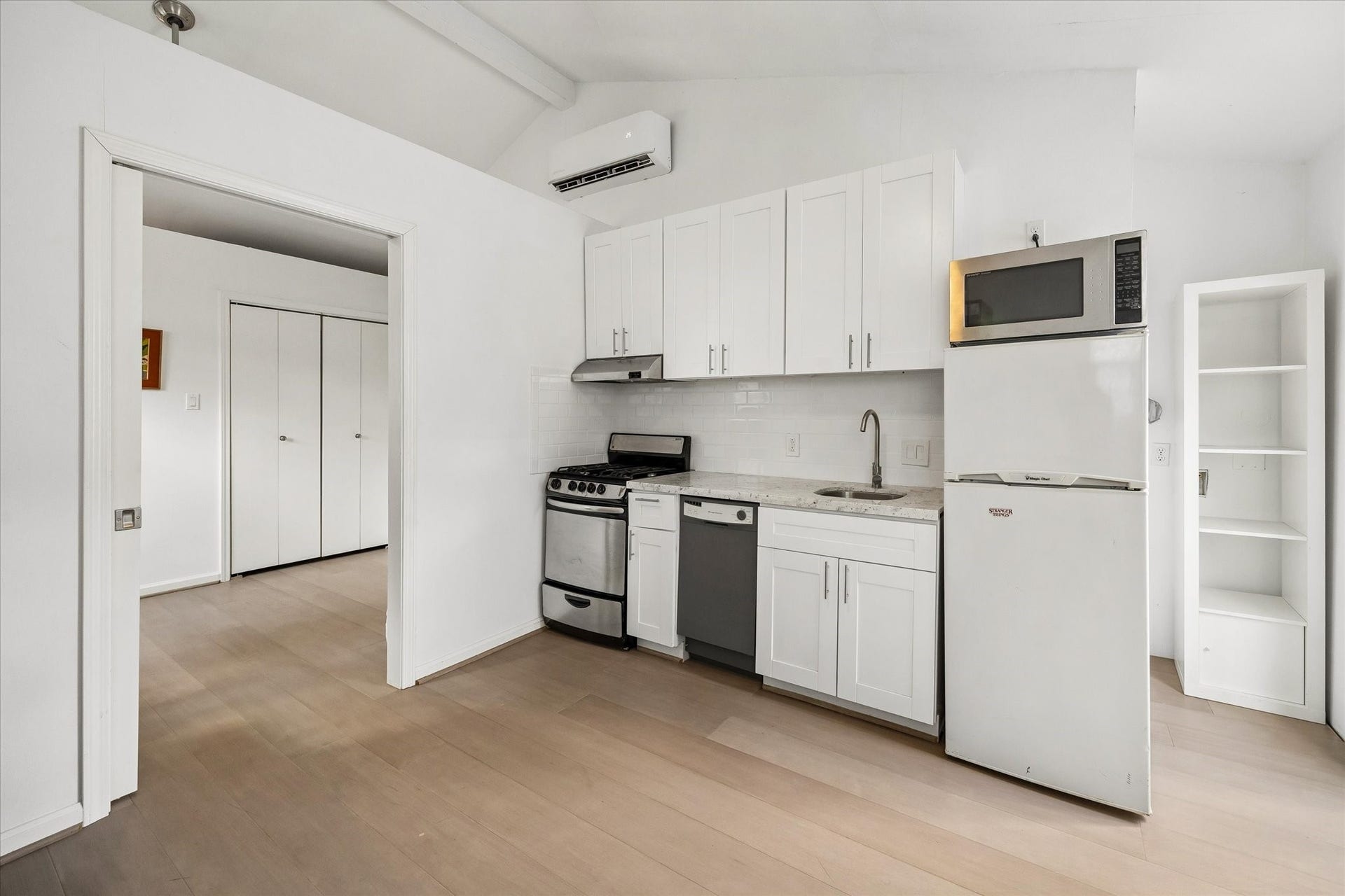 1232 Chantilly Lane, Houston, TX 77018 Private garage apartment with a full kitchen, dedicated living space, and separate bedroom, ideal for guests, a home office, or flexible living.