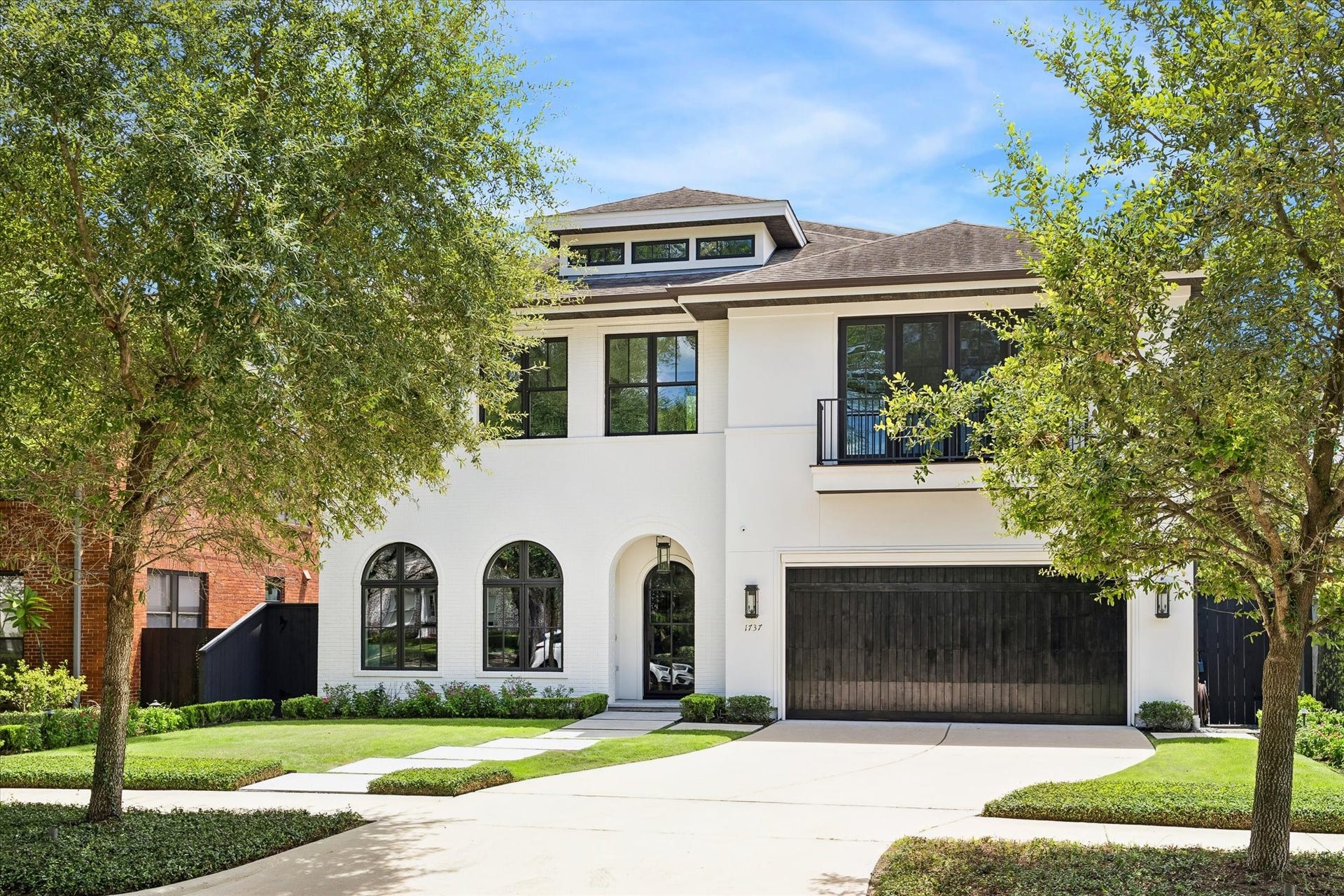 1737 Milford Street, Houston, TX 77098 Timeless architecture and manicured grounds create a striking presence along one of Boulevard Oaks' charming residential streets.