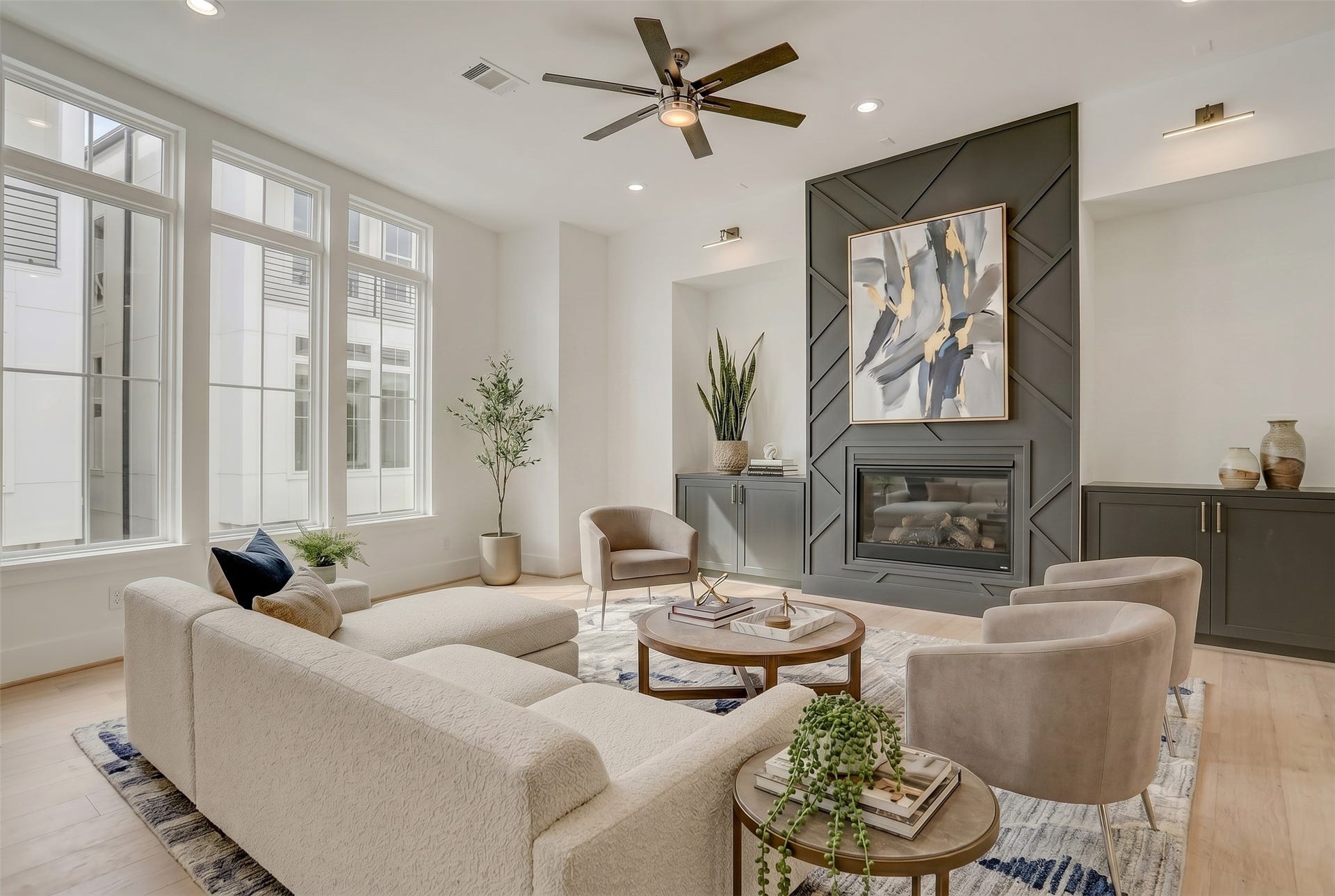 1907 Lauderdale Street, Houston, TX 77030 The second floor living area is showered in natural light and offers magnificent focal points and size. Virtually staged photo.