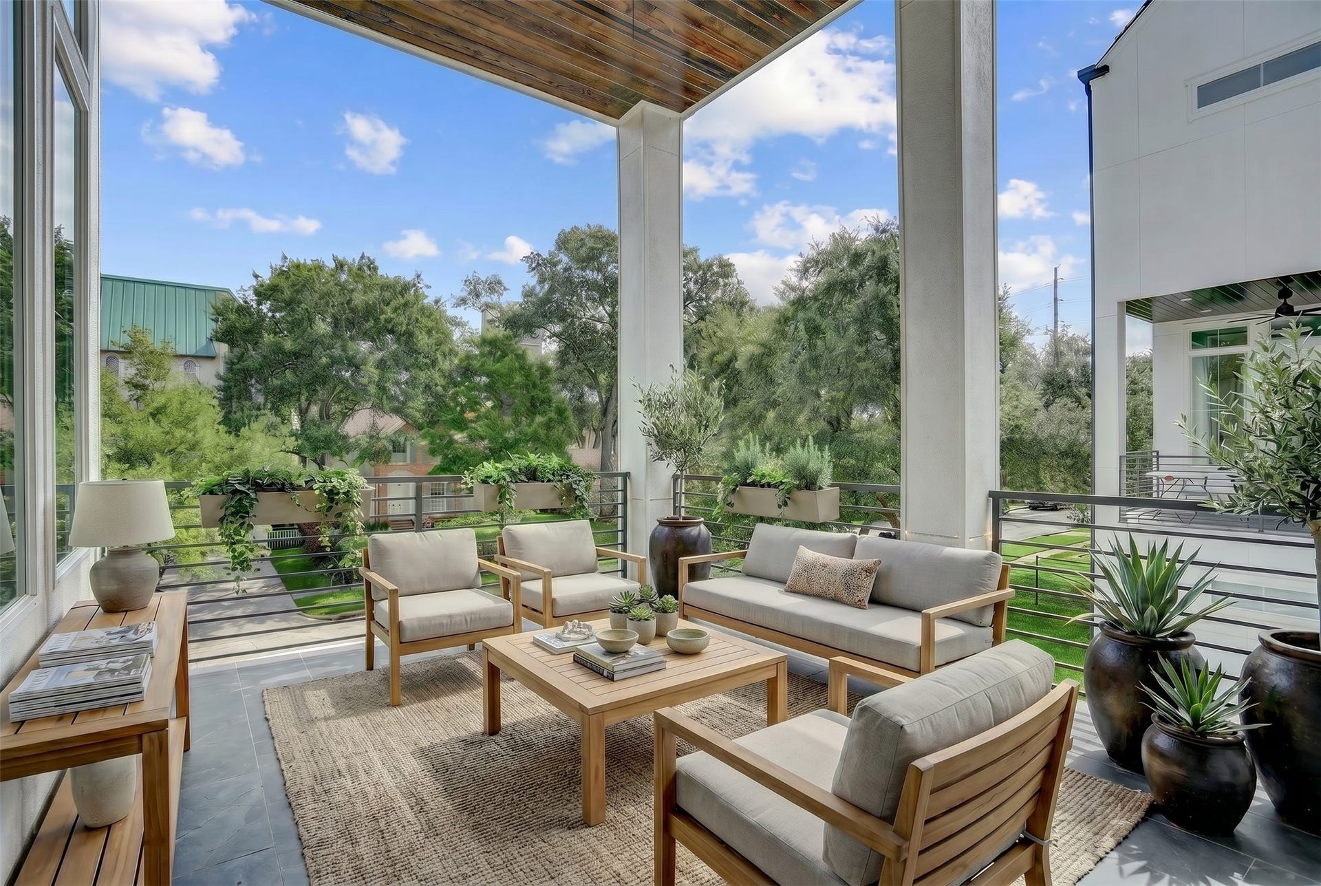 1907 Lauderdale Street, Houston, TX 77030 The covered terrace off the kitchen offers a fantastic living or dining space with a natural gas connection. Virtually staged photo.
