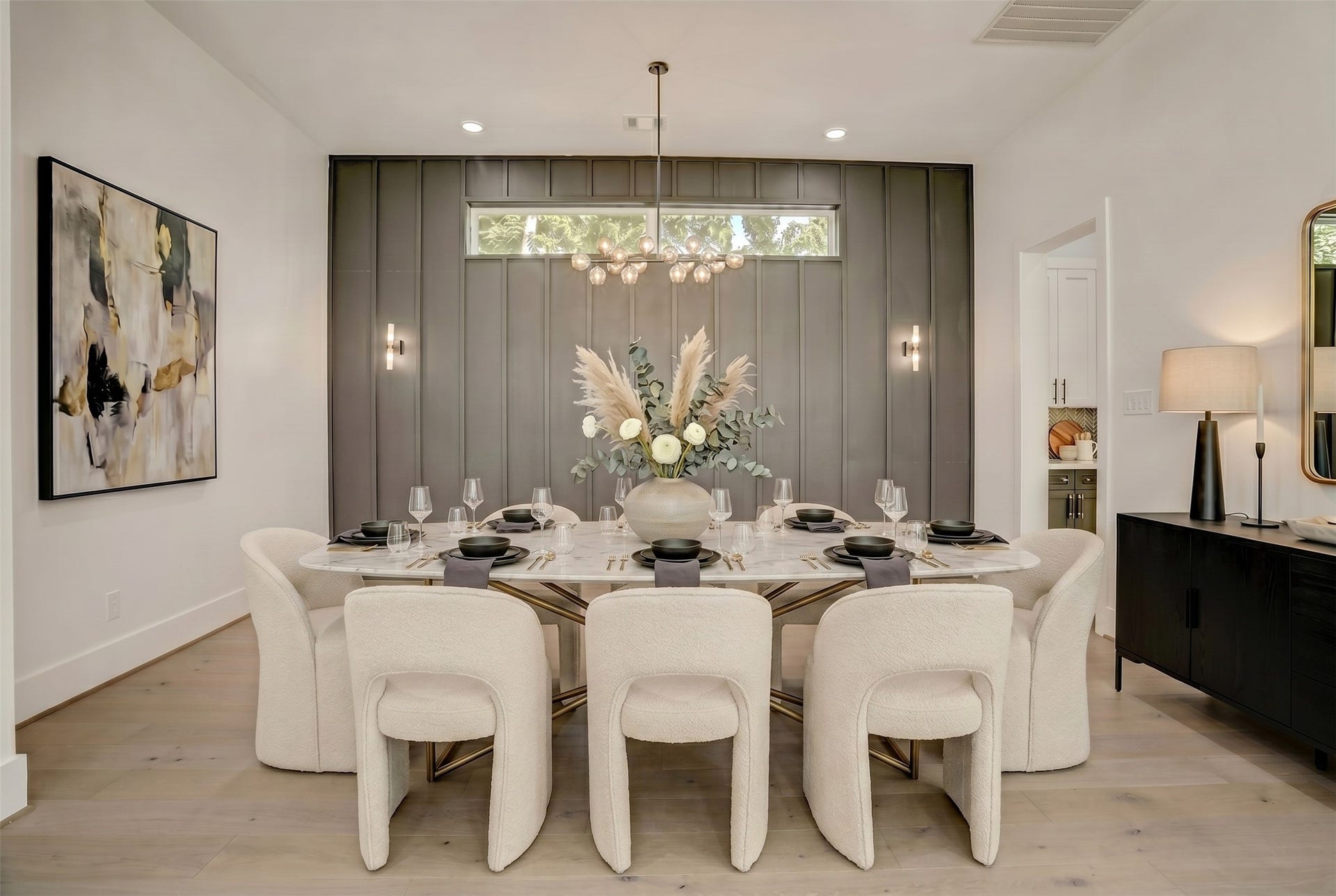 1907 Lauderdale Street, Houston, TX 77030 Completely open to the living area is a private dining room with stunning accent wall. Virtually staged photo.