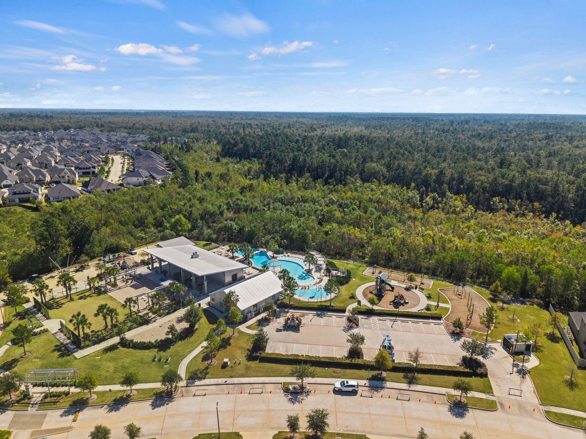 Enjoy resort-style living with a community pool, splash pad, clubhouse, and scenic walking trails, all designed for relaxation and outdoor fun.