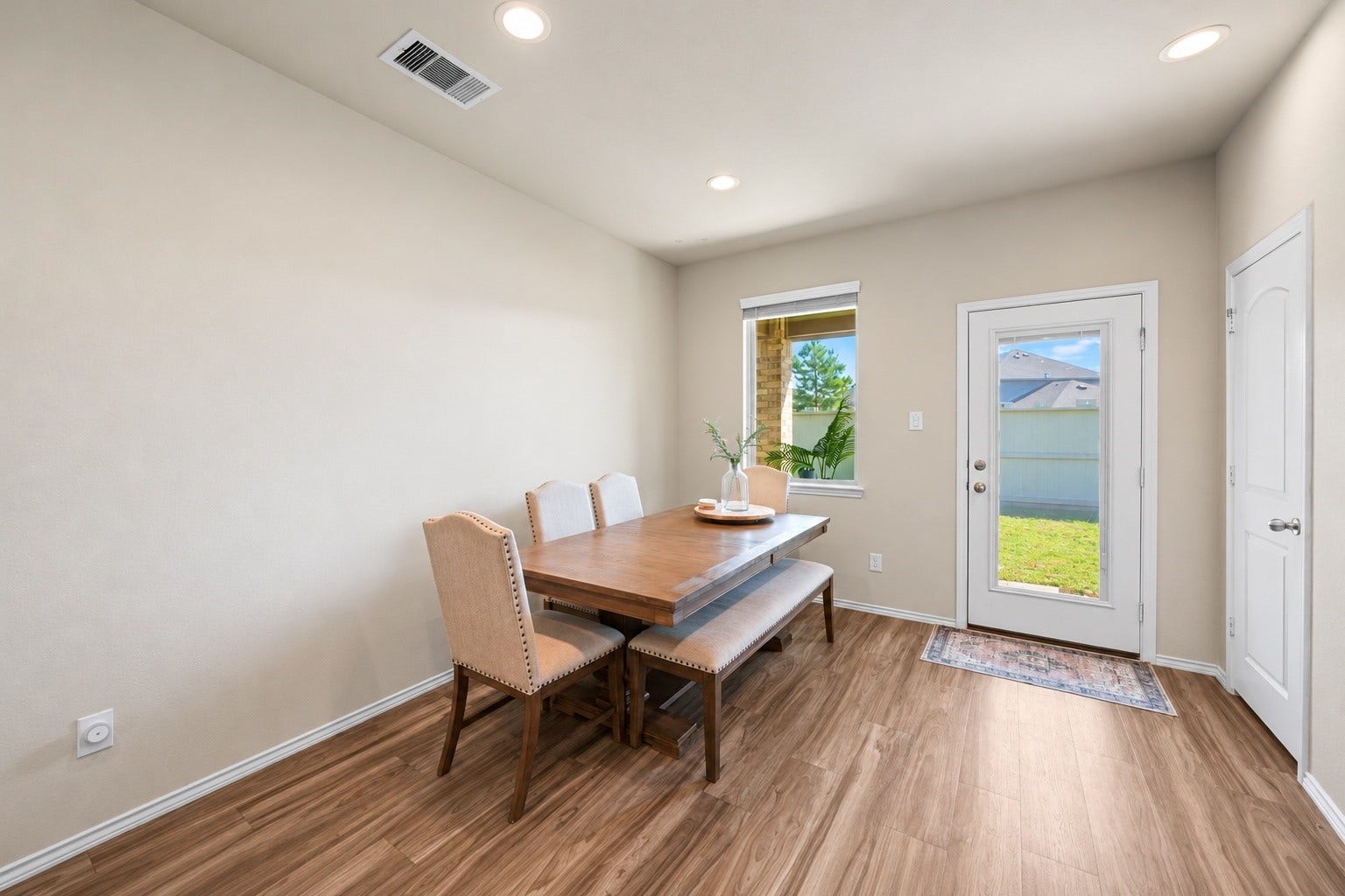 Inviting dining area with natural light and an easy flow into the kitchen, perfect for everyday meals and memorable gatherings.

Virtually Enhanced